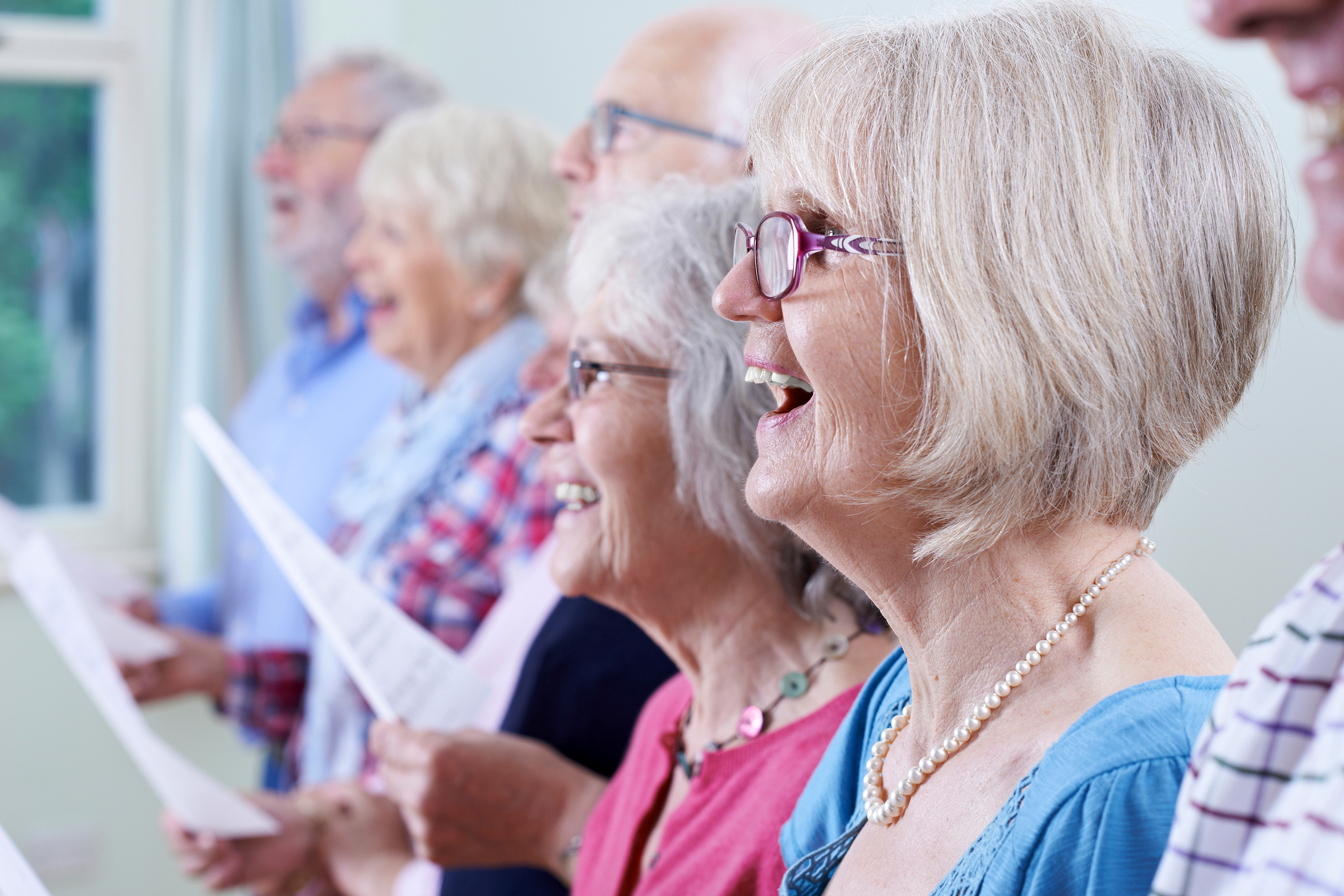 Seniors singing in a choir