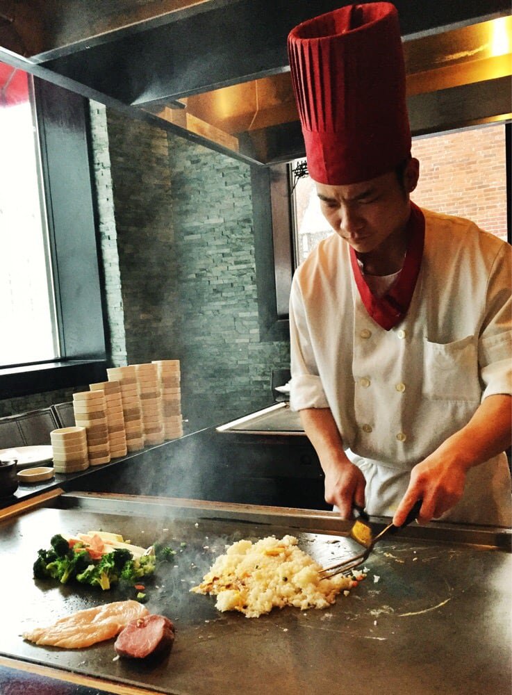 Chef preparing food on the hibachi
