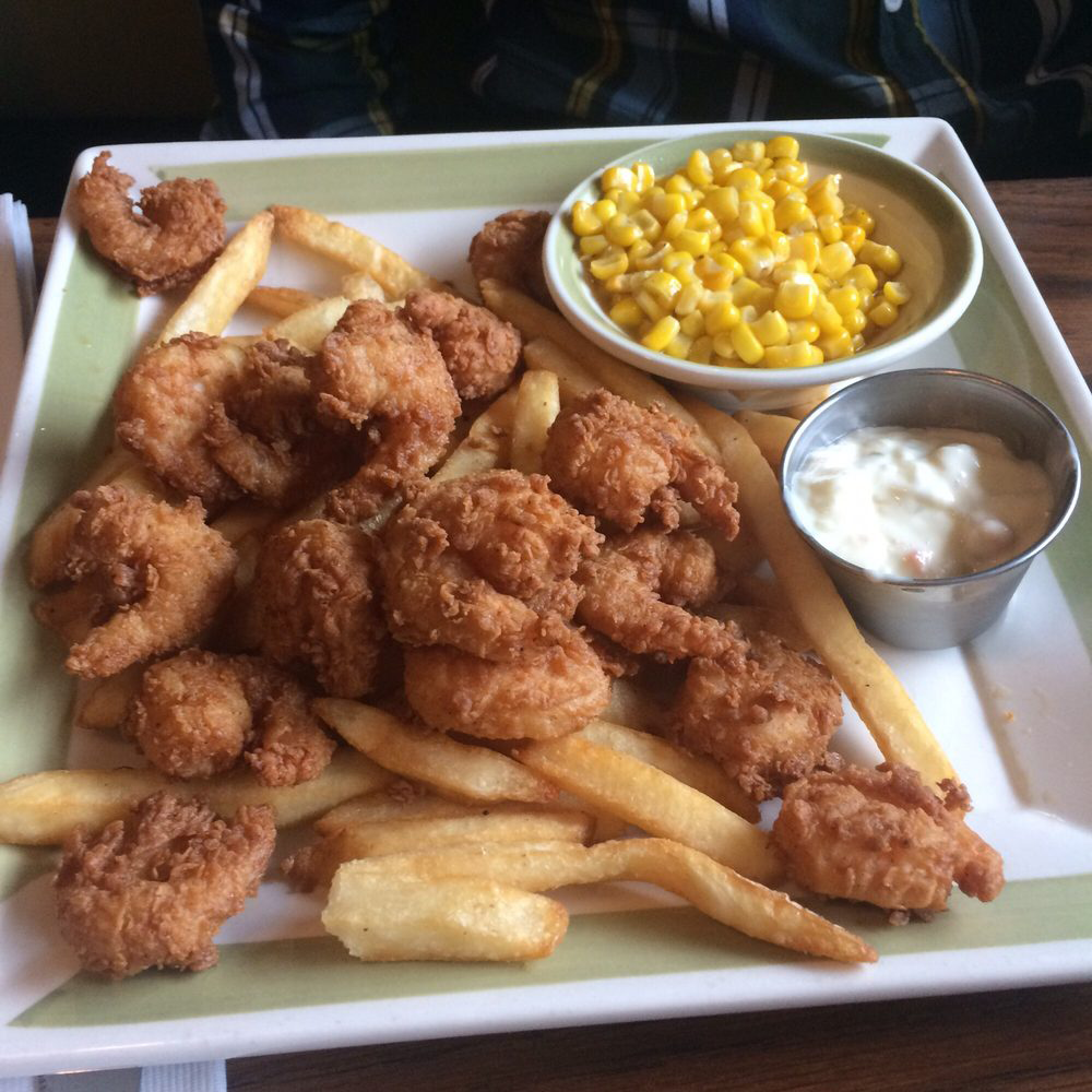 Fried shrimp with fries and corn