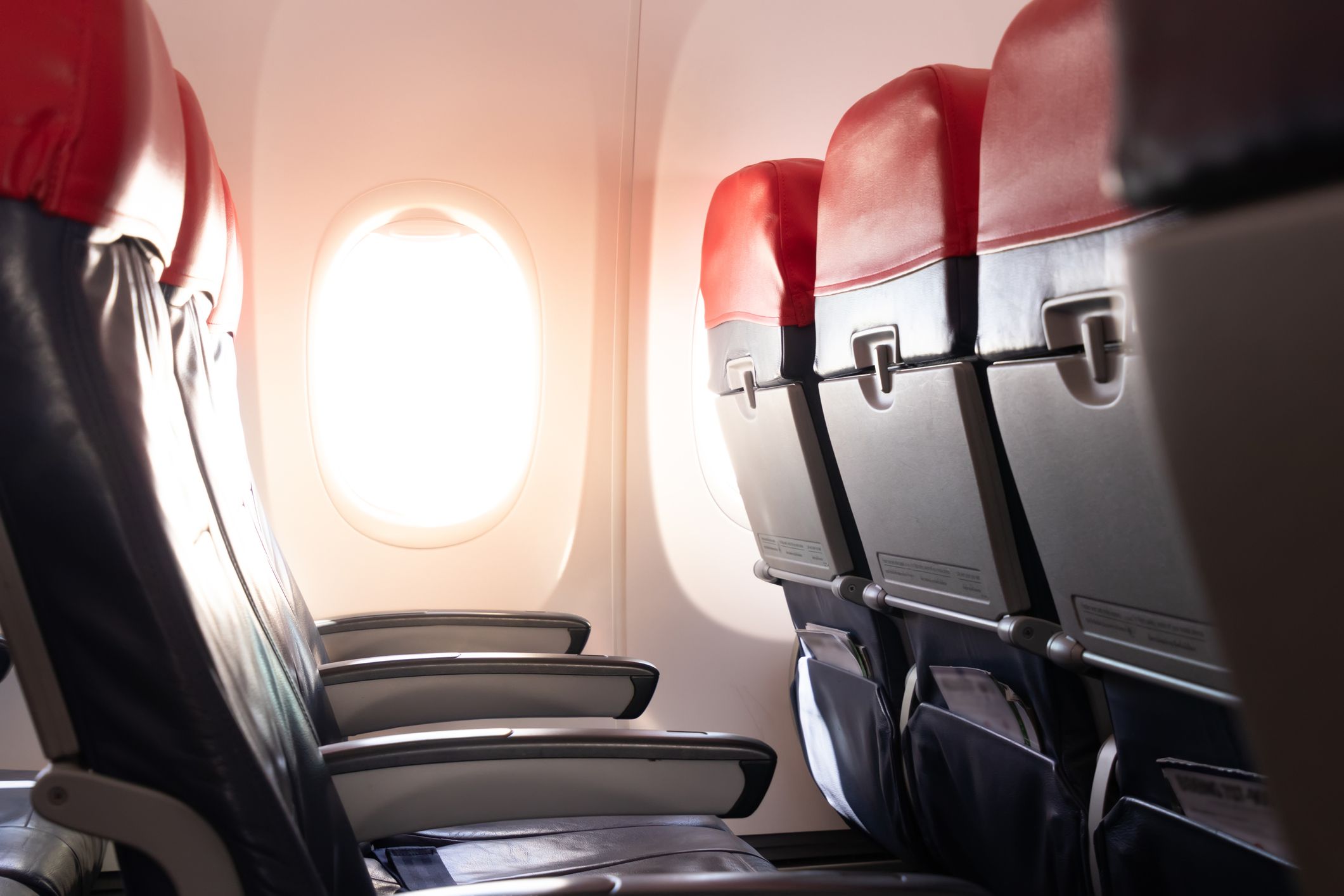 Empty airplane seats and window. Passenger seats in economy class.airplane interior