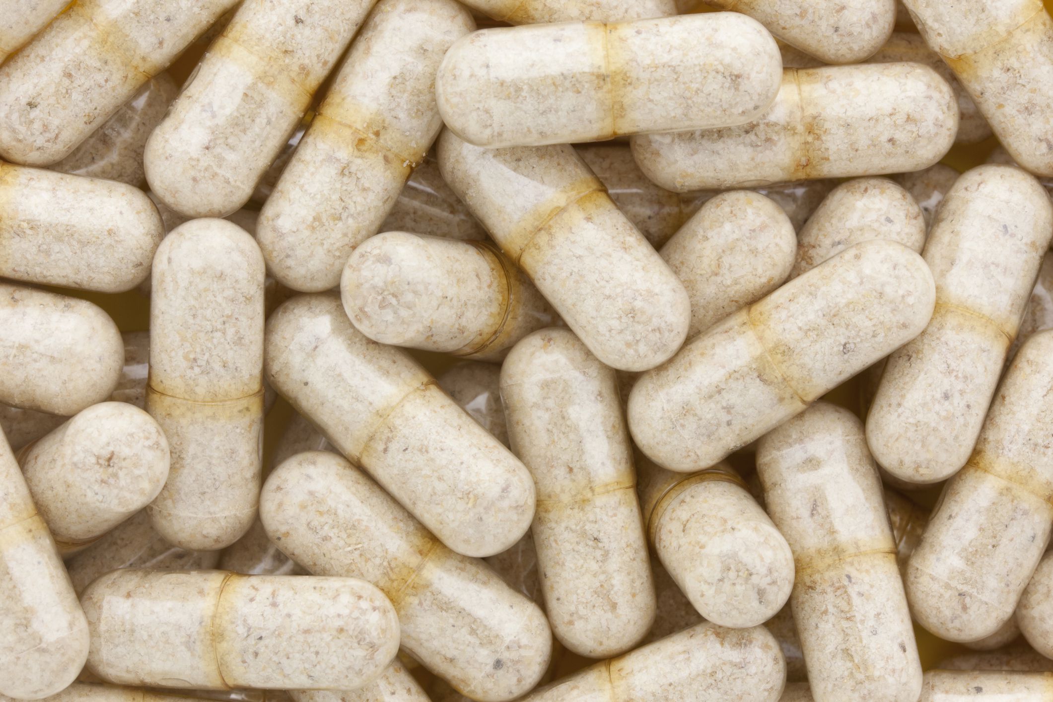 Ground psyllium in clear capsules is taken as a dietary fiber supplement. At certain dose levels this all natural supplement is taken as a cholesterol reducer.