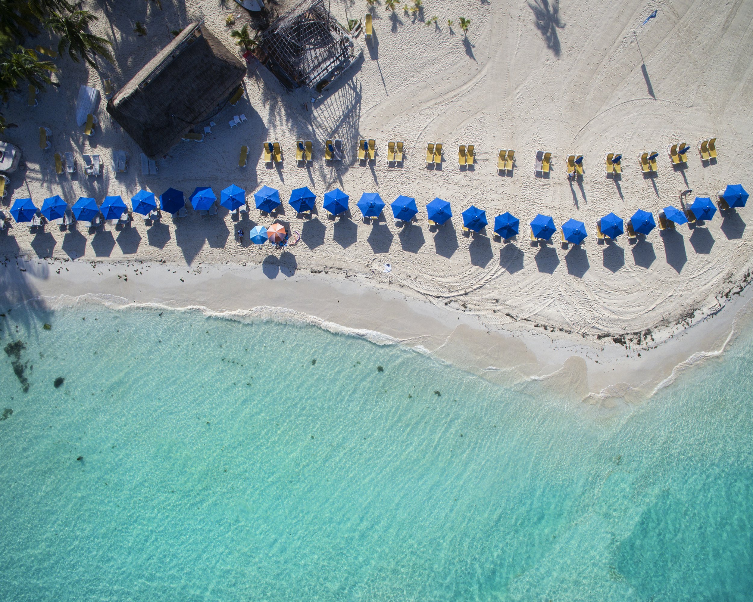 umbrellas on the beach of Isla Mujeres