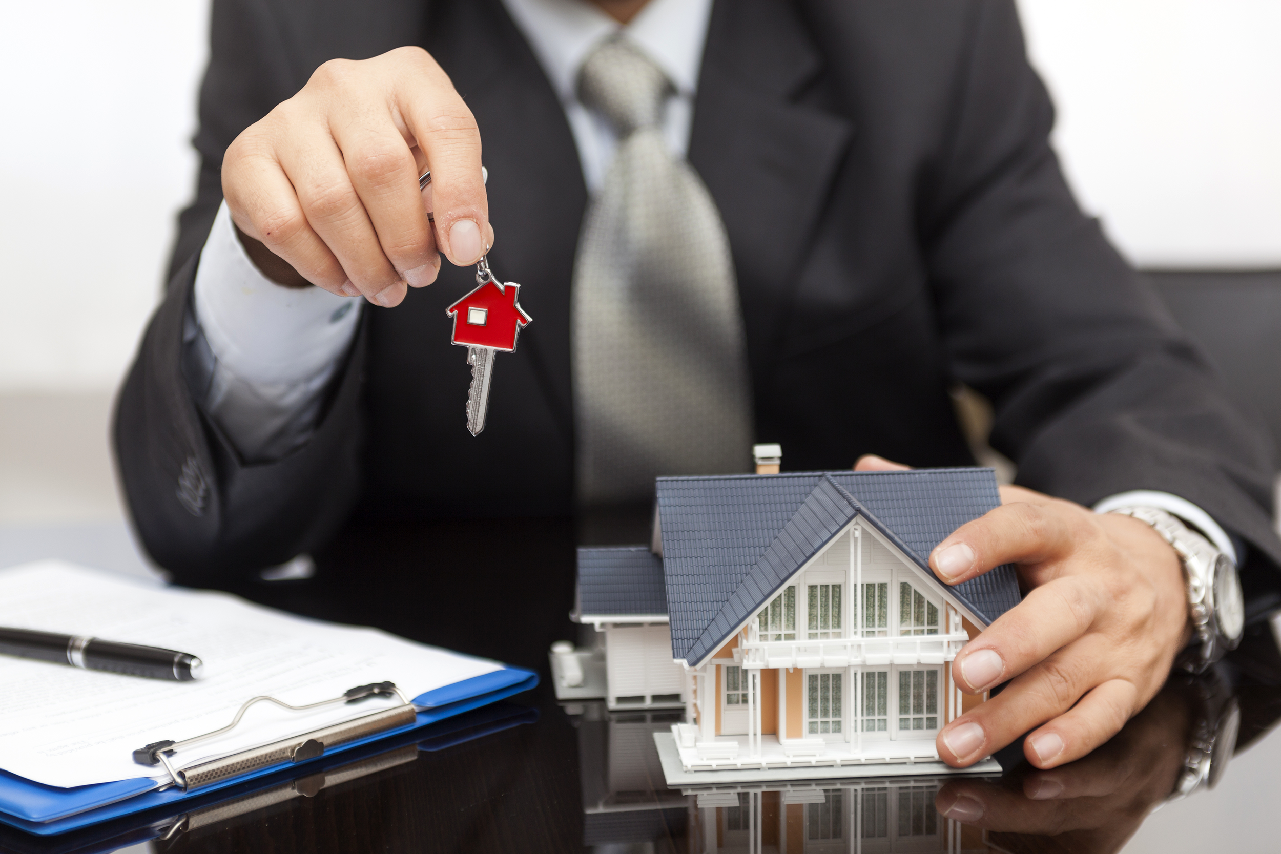 Mortgage broker holding house keys