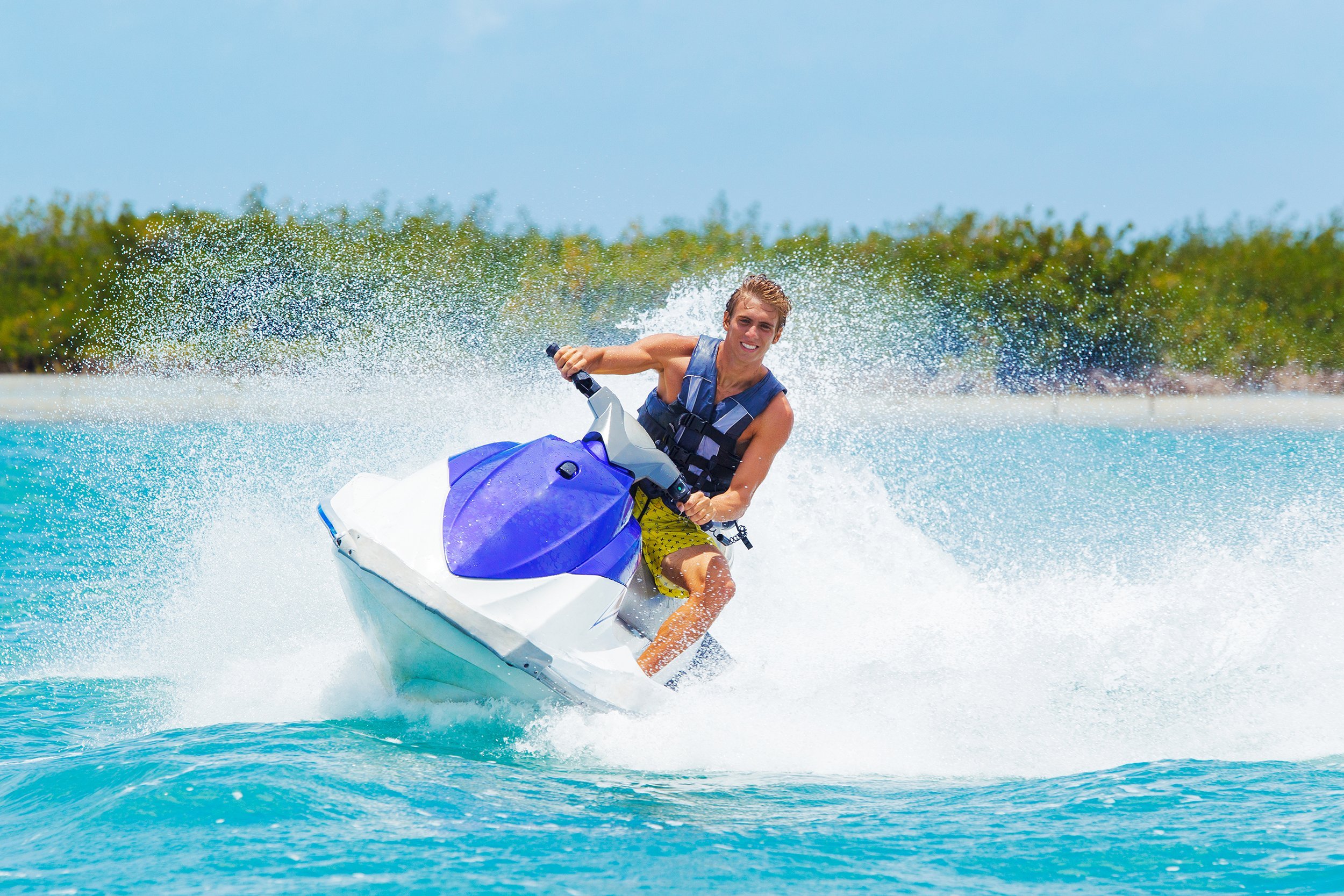 man on jet ski having fun in the ocean