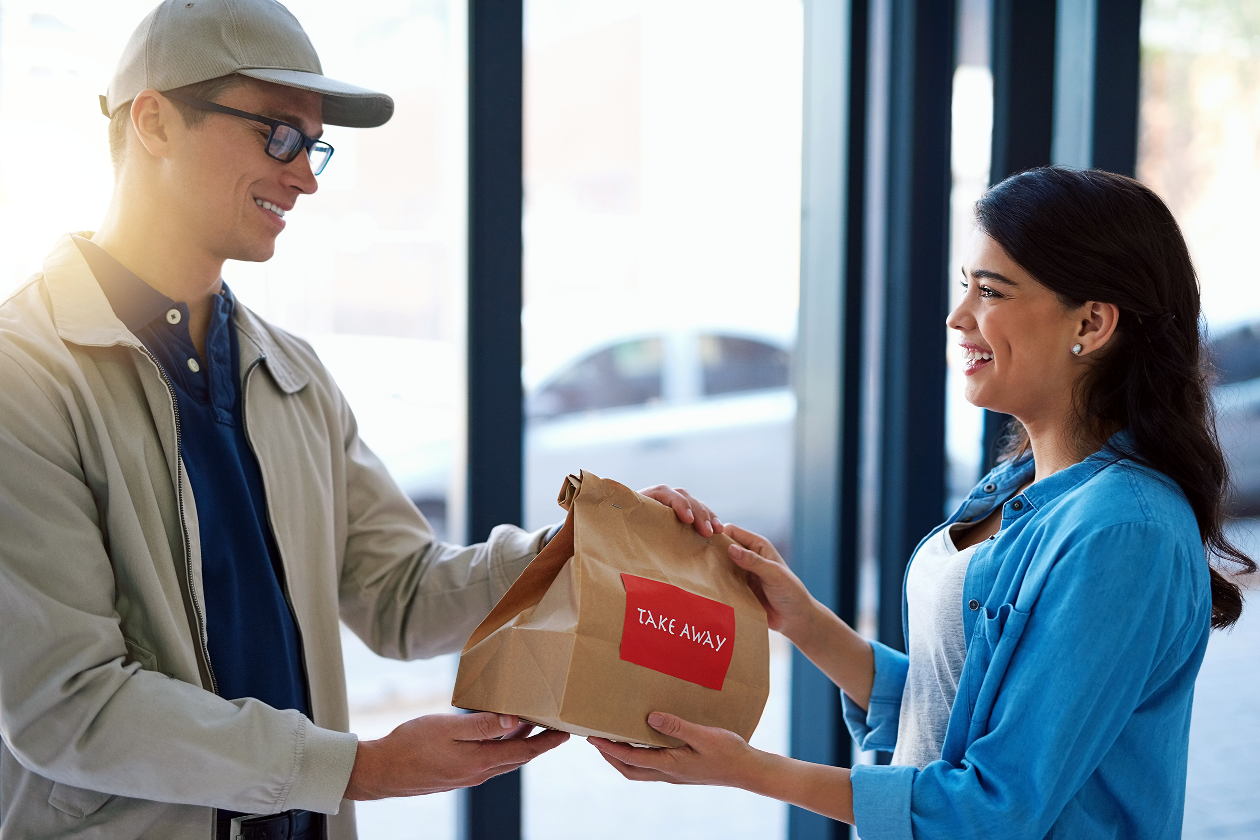 Young man delivering food