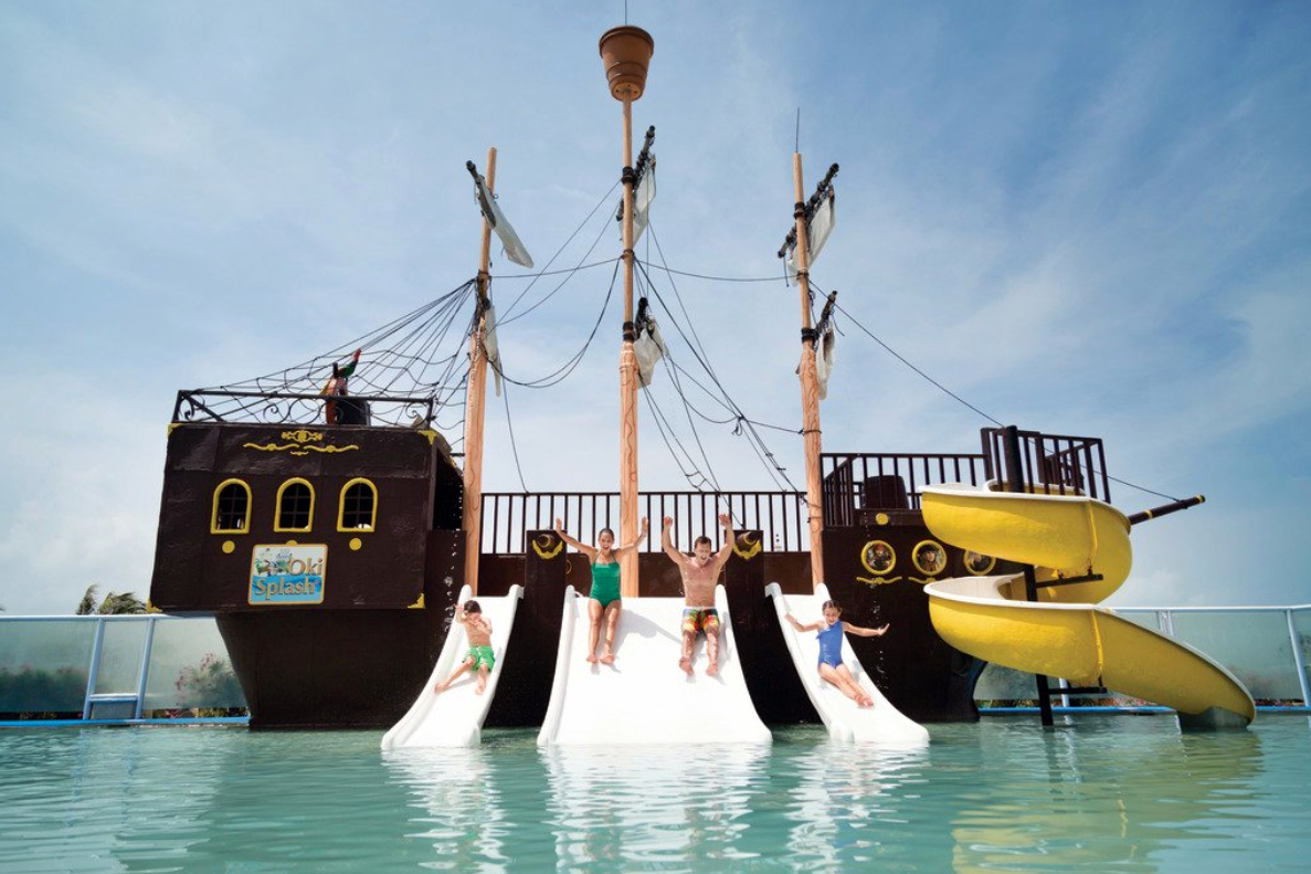 Family on a water slide at Panama Jack Resort in Cancun