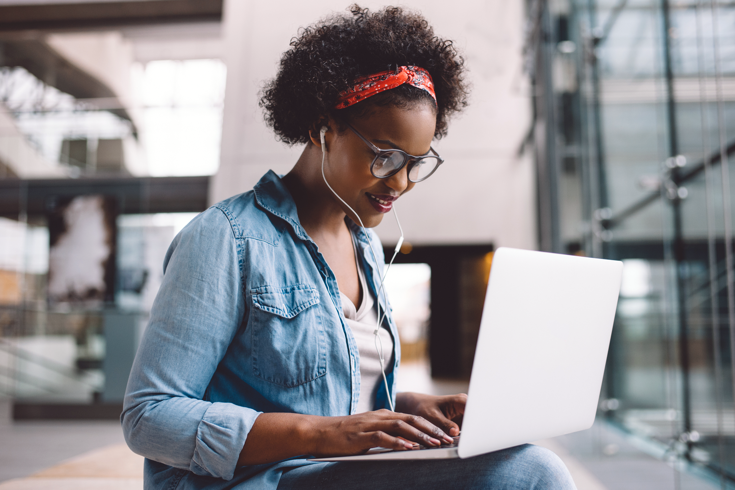Woman working and listening to music