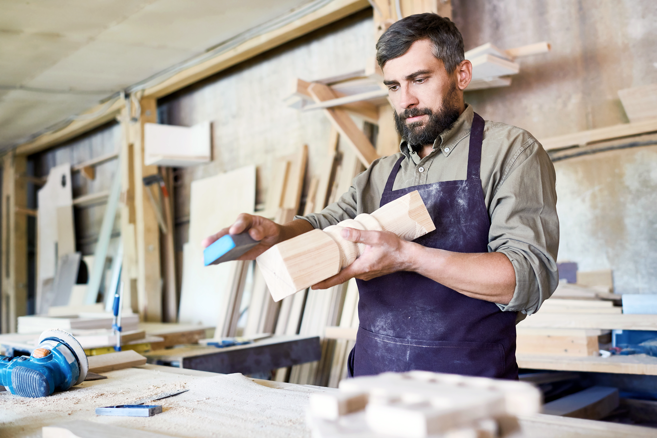 Carpenter building in his workshop