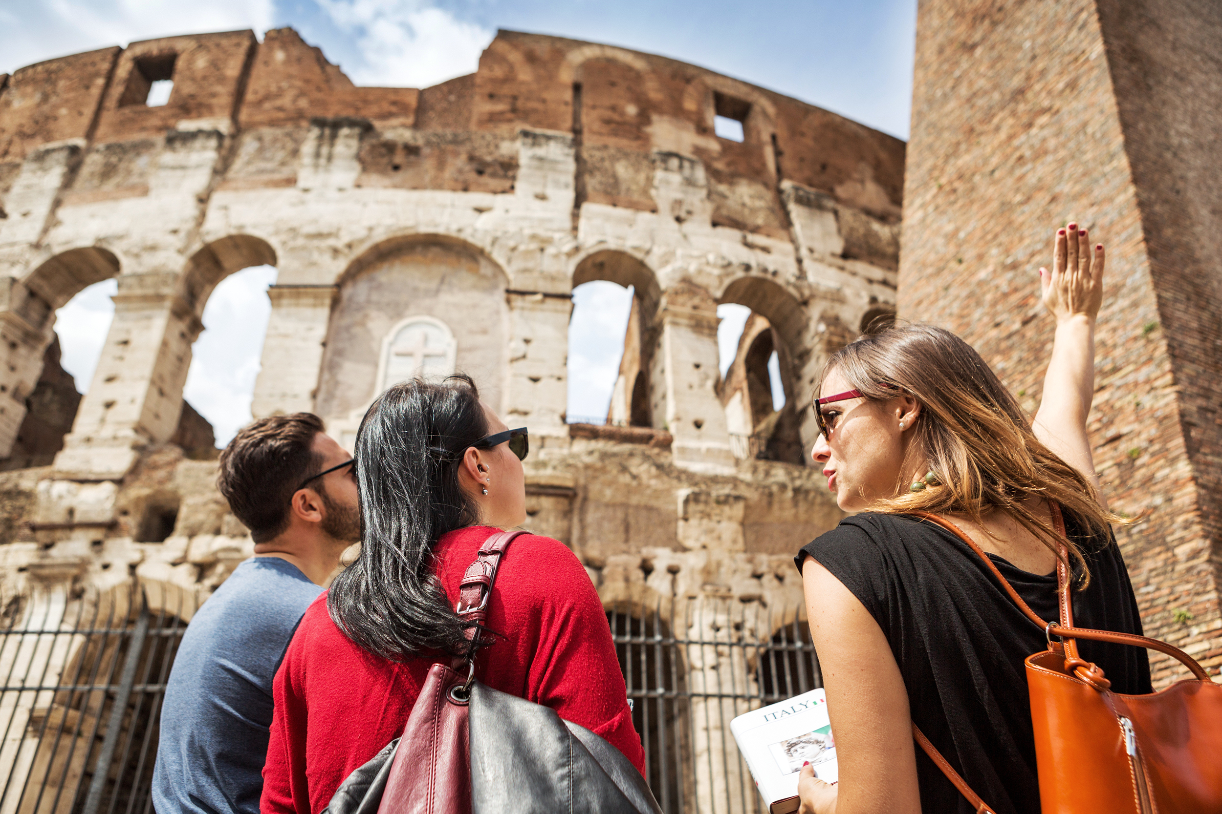 Woman giving a tour of the Colosseum