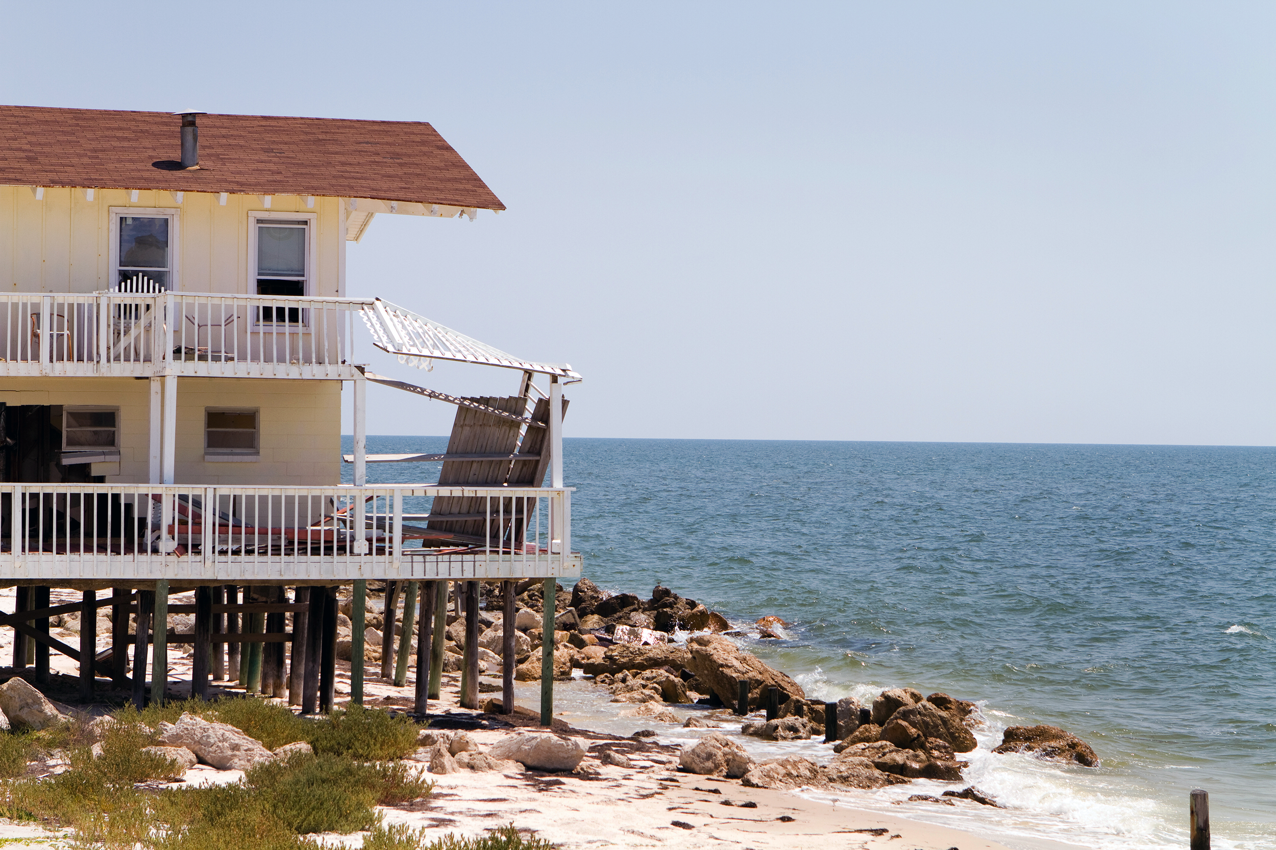 Beach house with damage from a storm or erosion