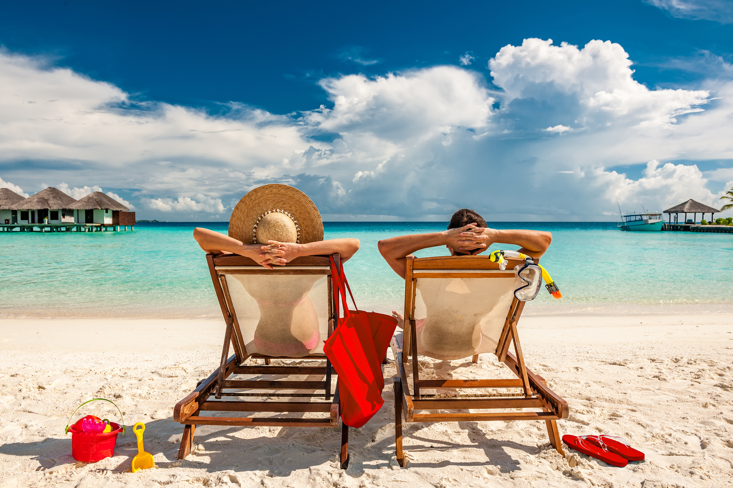 Couple relaxing on the beach