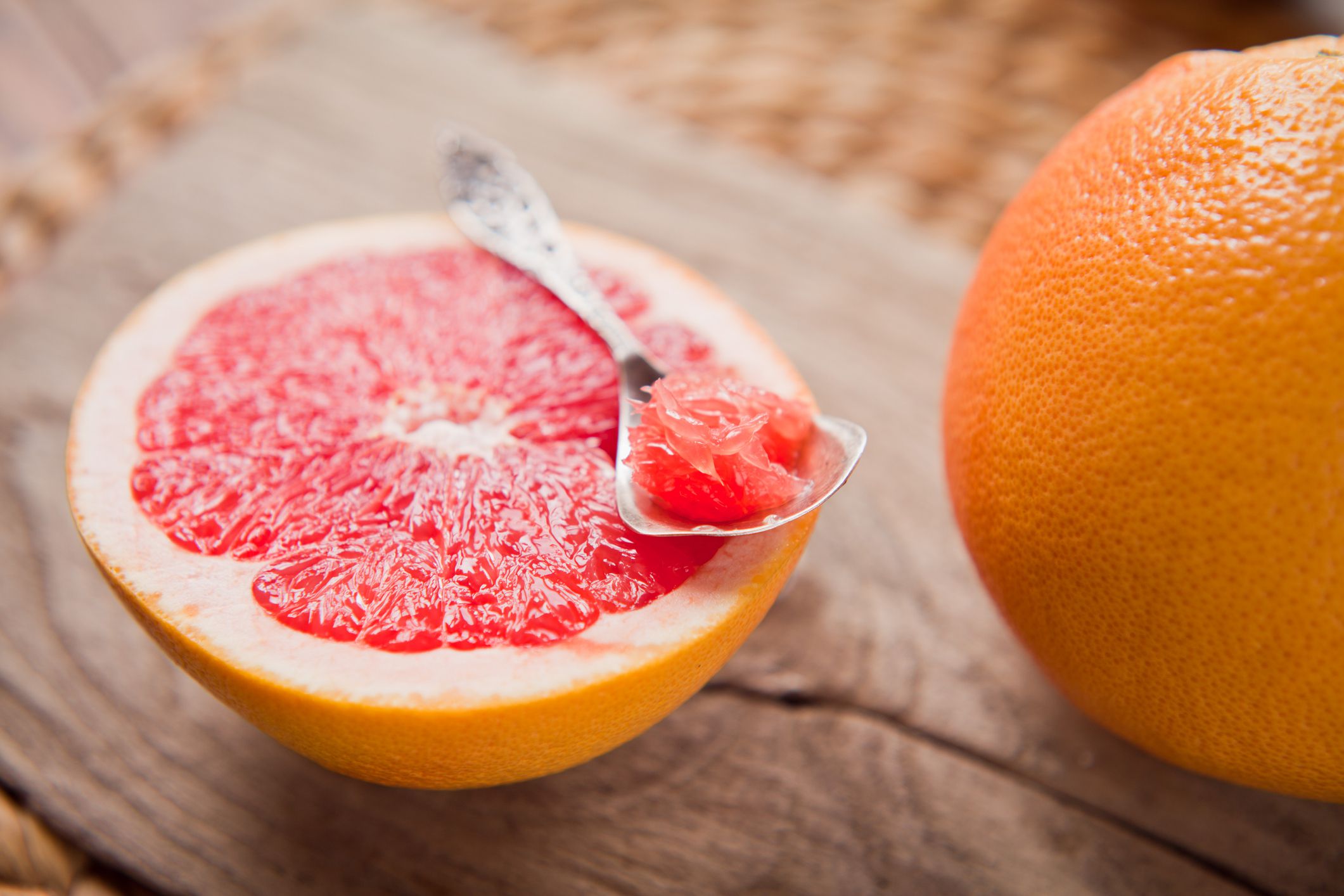 Pink grapefruit with sugar - macro. Perfect helathy sumemr snack or breakfast.