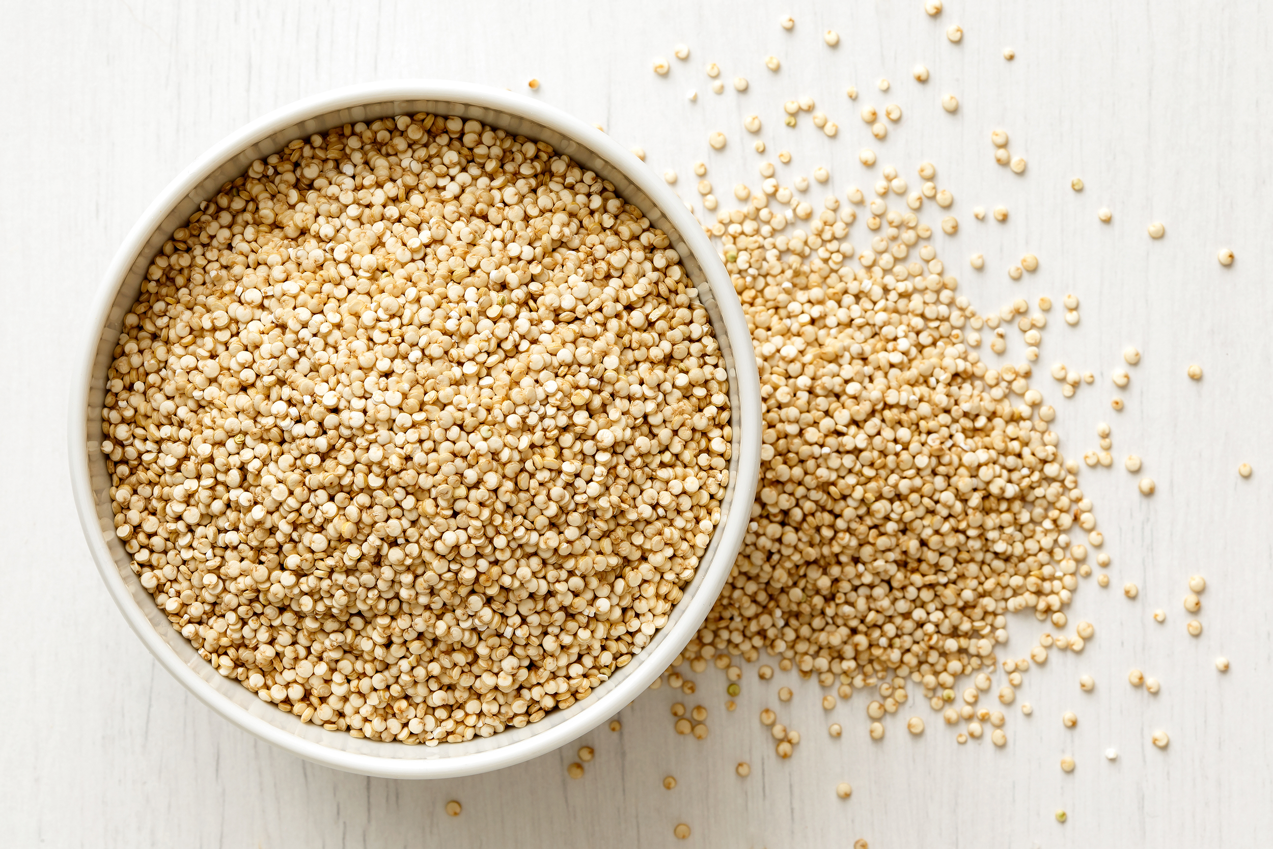 Bowl of uncooked quinoa