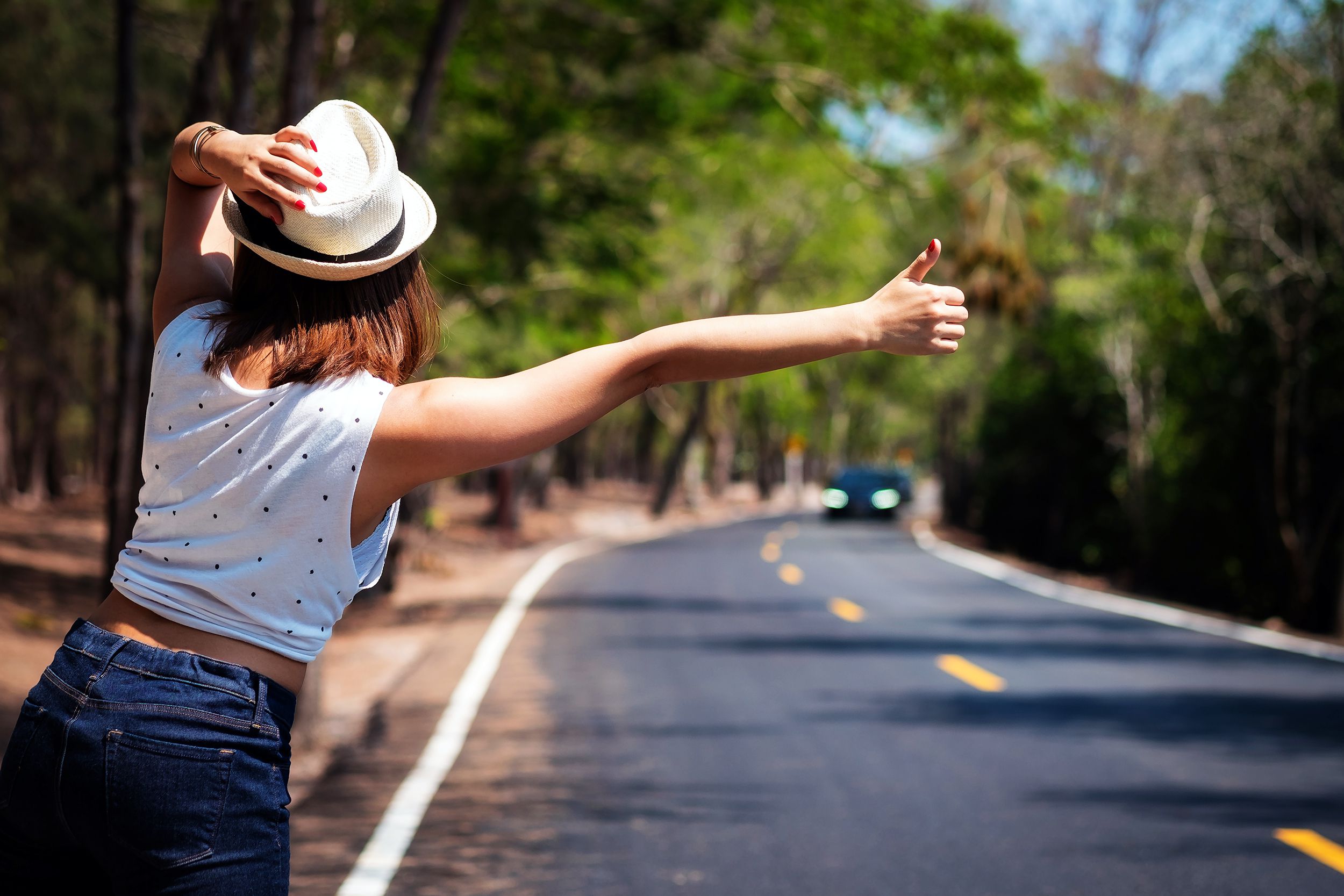 Girl hitchhiking