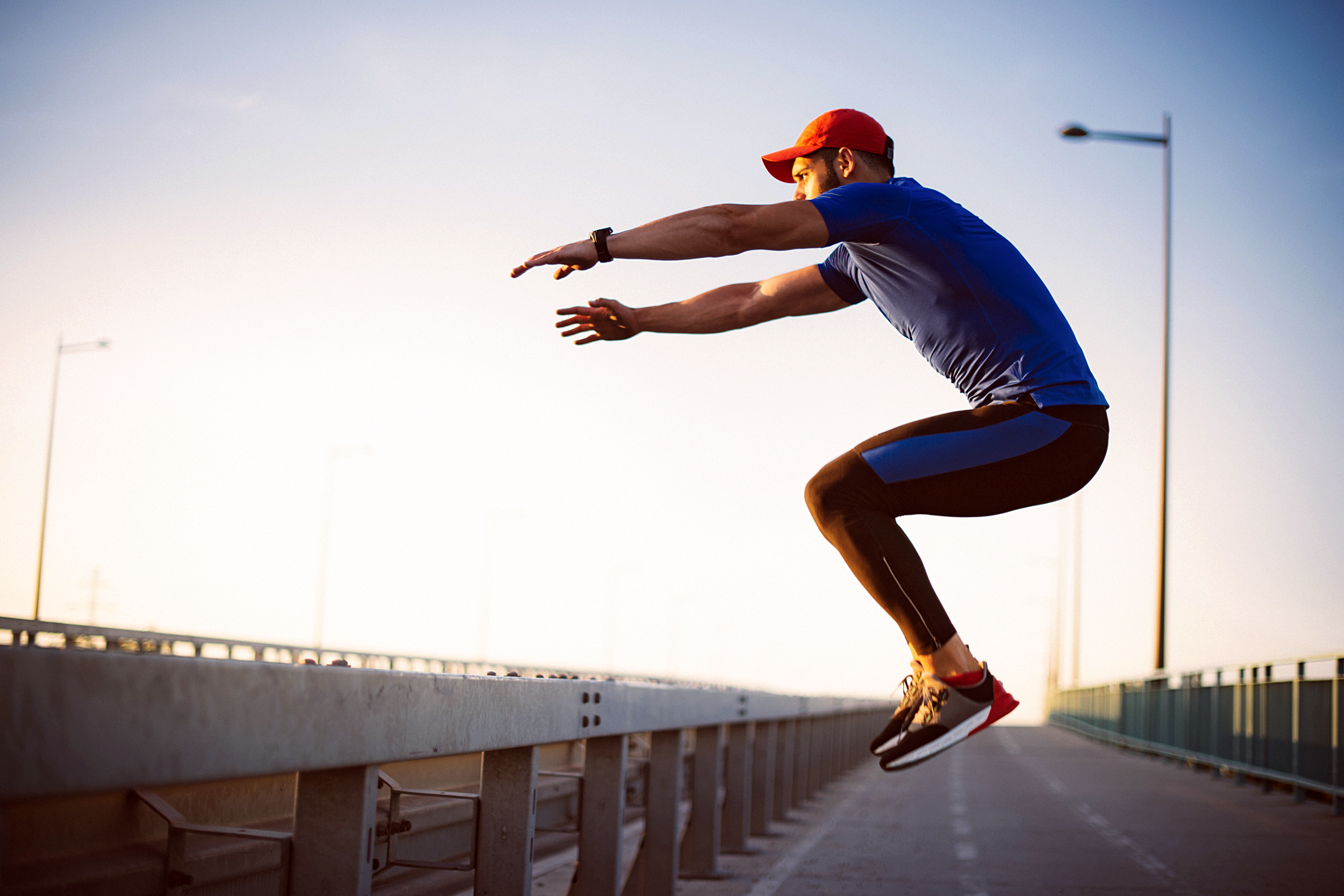 Man doing a jumping squat