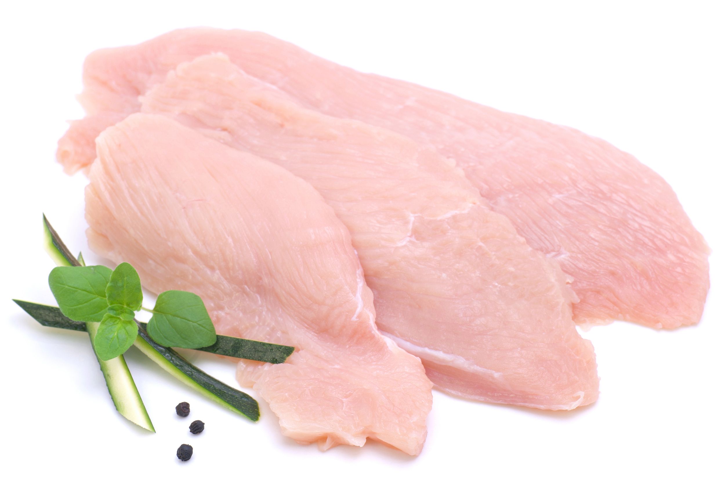 three slices of skinless boneless chicken breast and spices