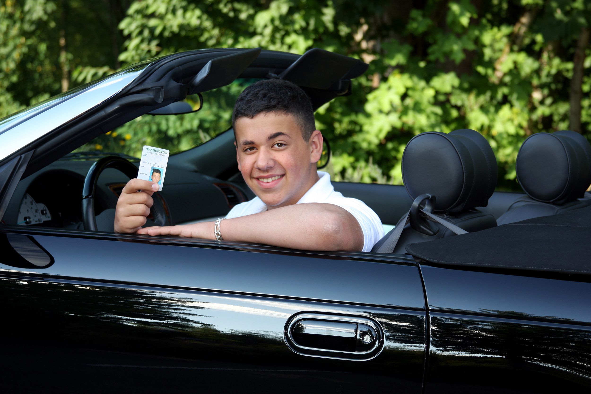 teen with driver's permit in sports car