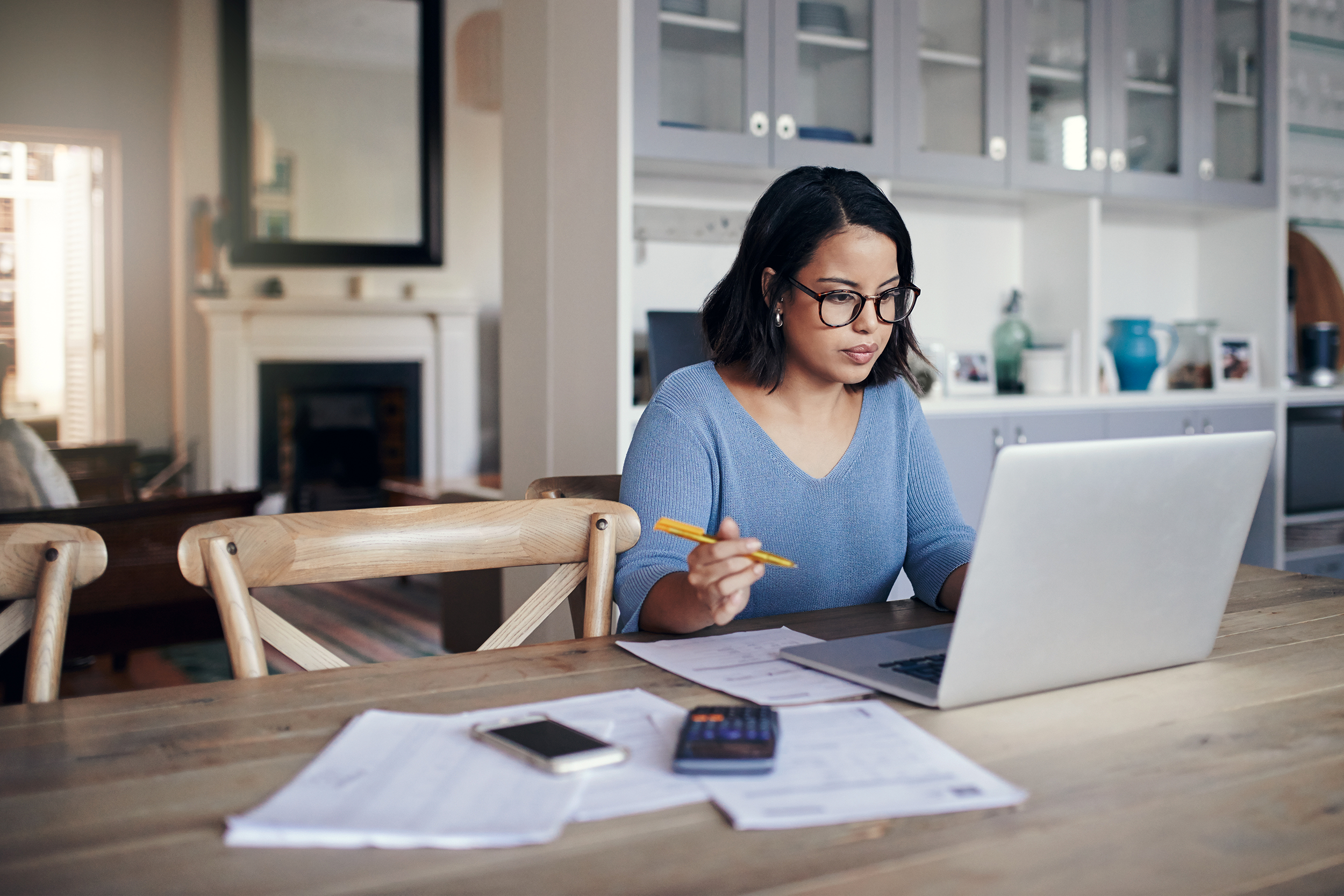 Woman working from her kitchen