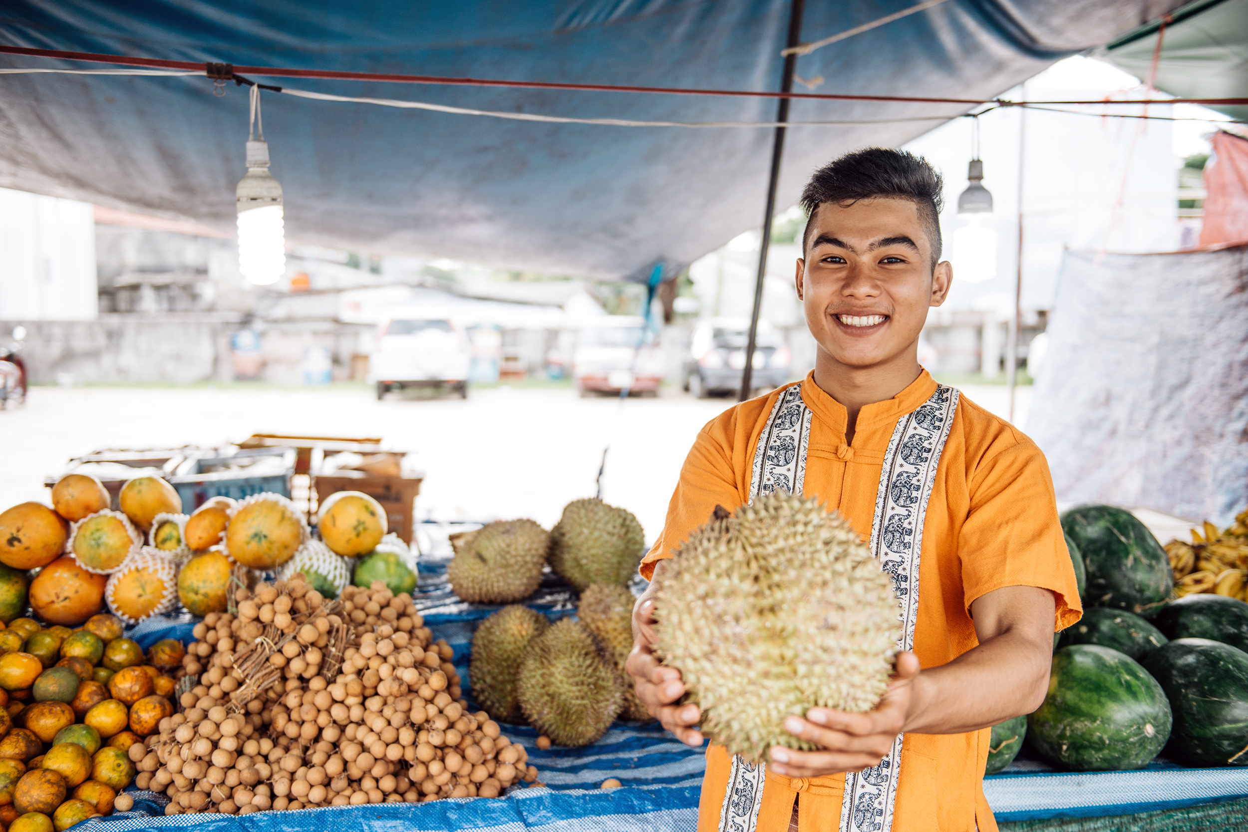 Organic farmer in Thailand at a market