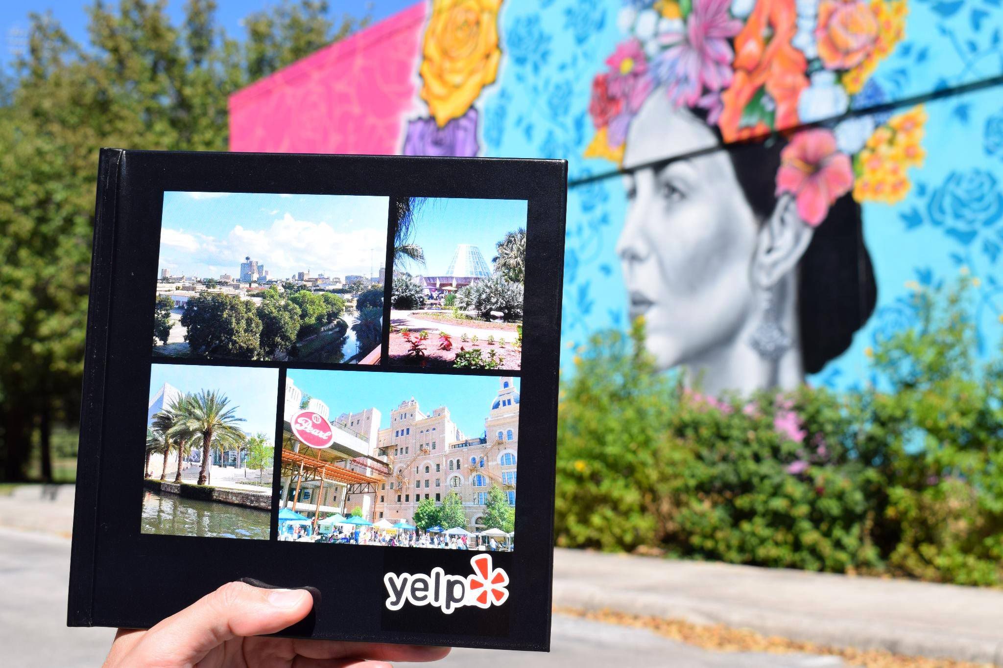 Photo collage in front of a mural