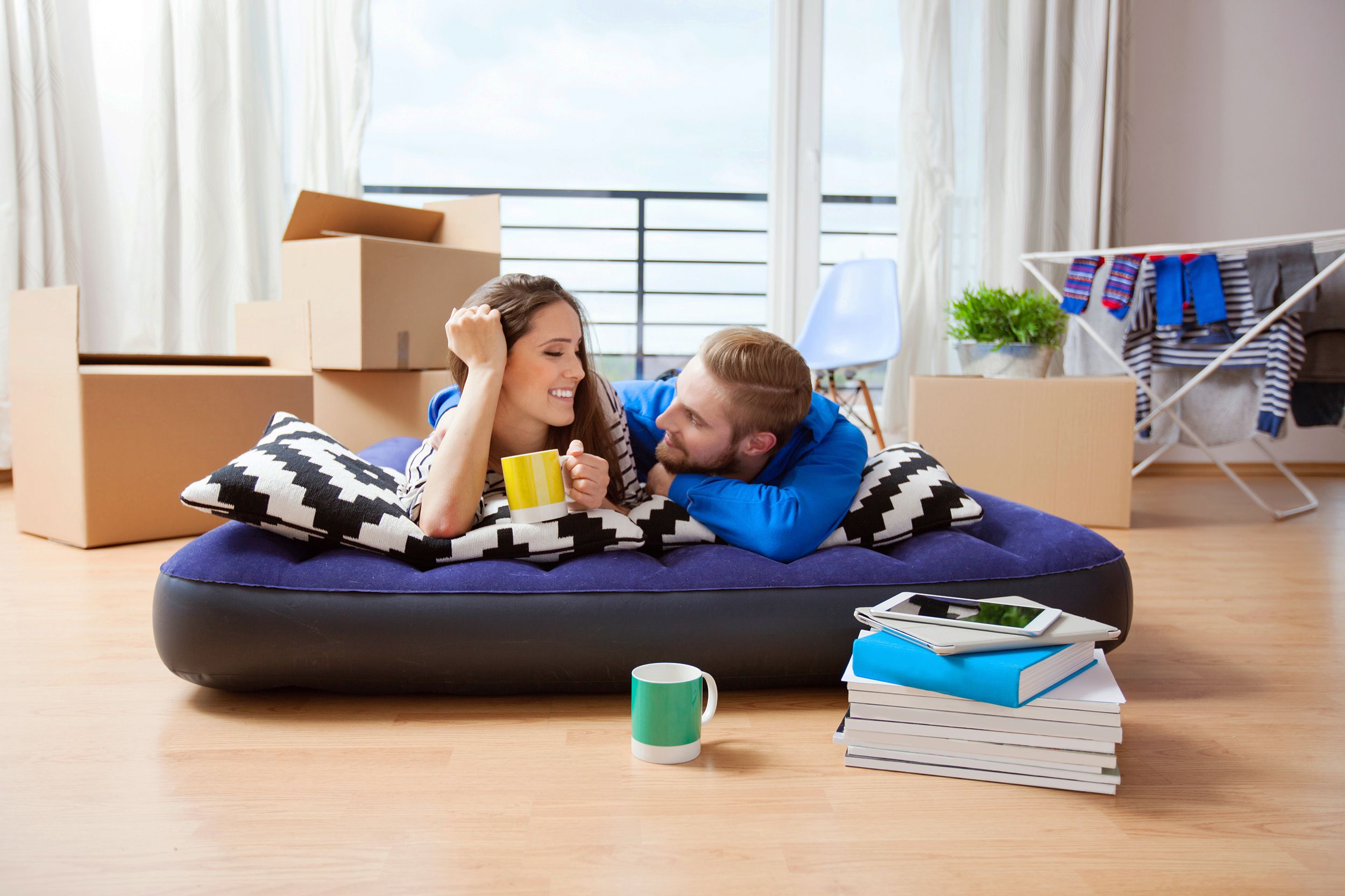 young couple in their new apartment