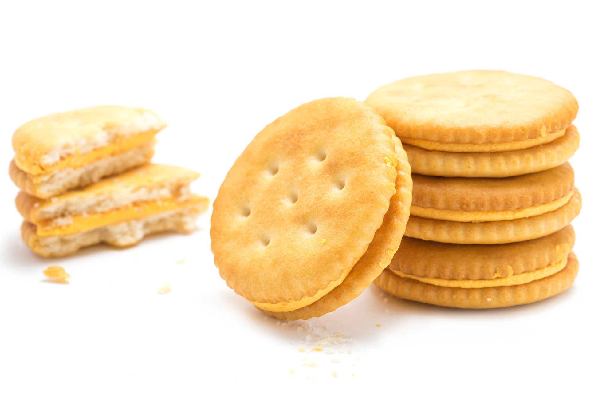 stuffed cheese crackers snacks stacked and cut in half