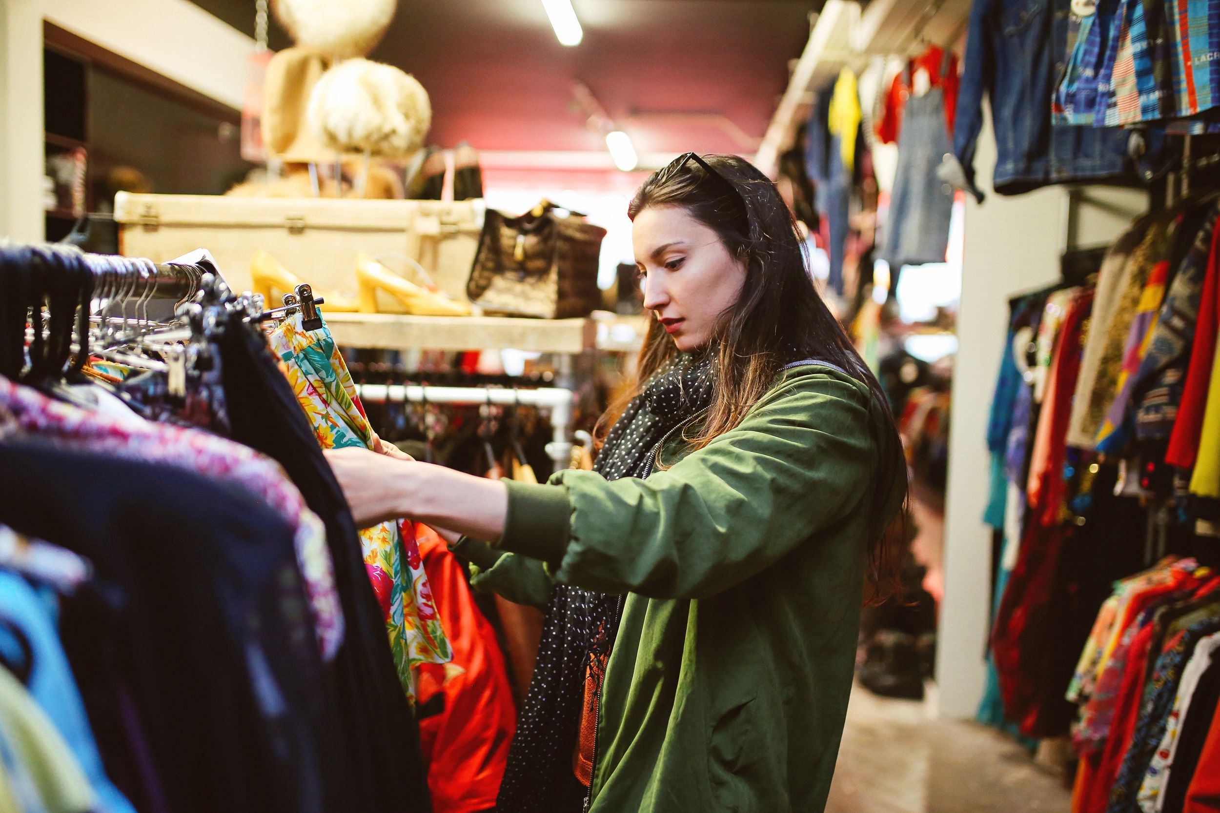 woman shopping in secondhand clothing store