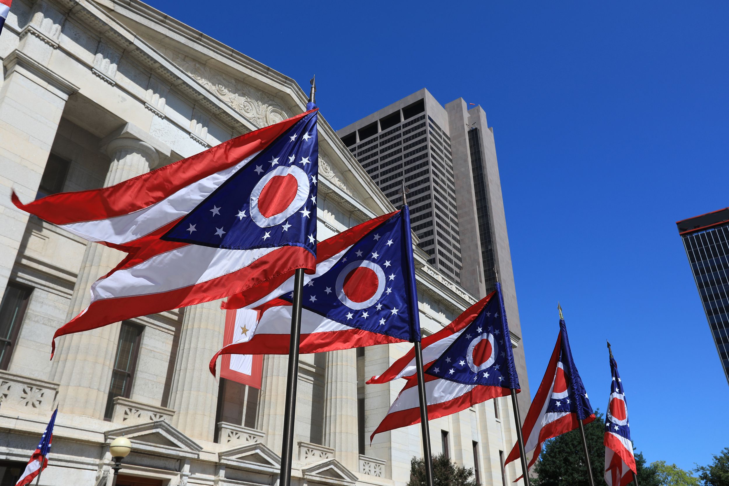 Ohio statehouse with flags in Columbus, Ohio