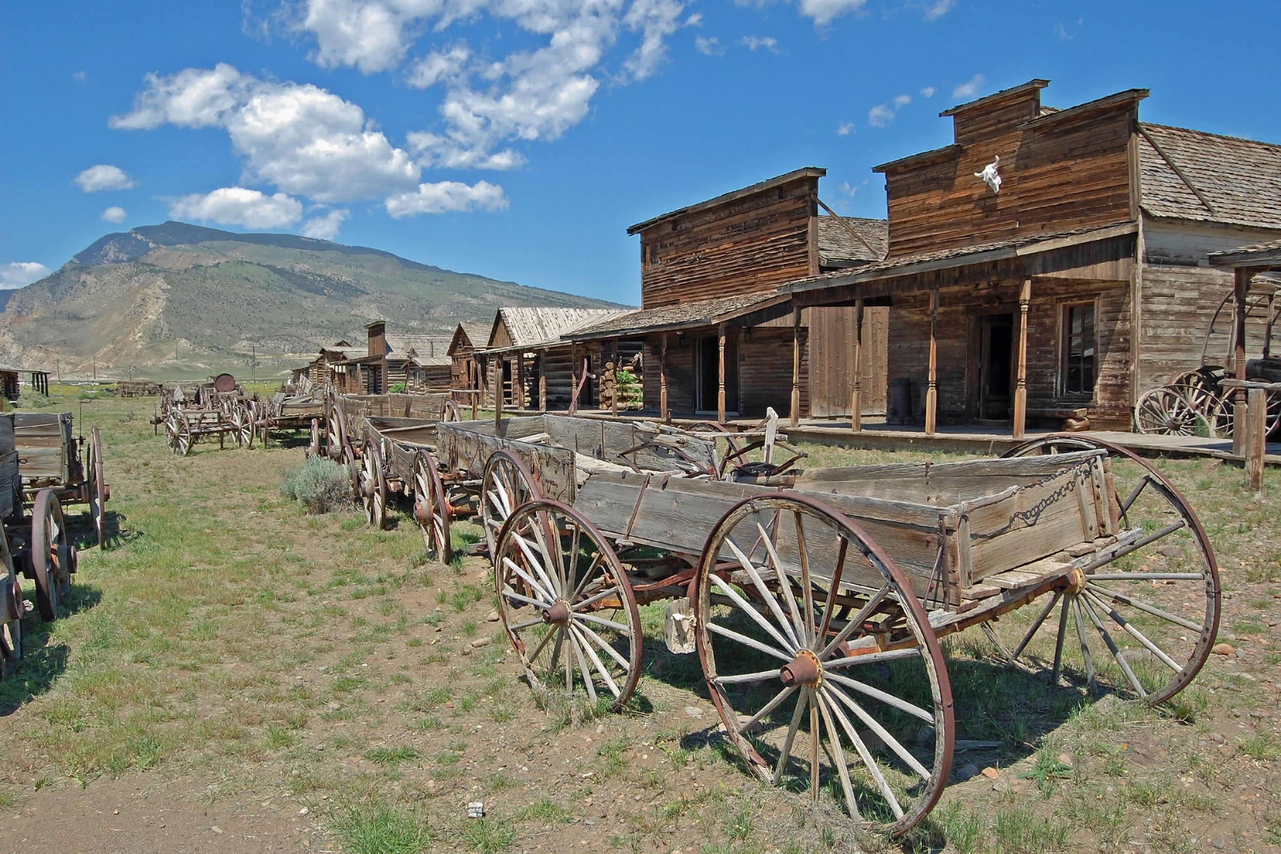 old wooden wagons in a ghost town, Wyoming