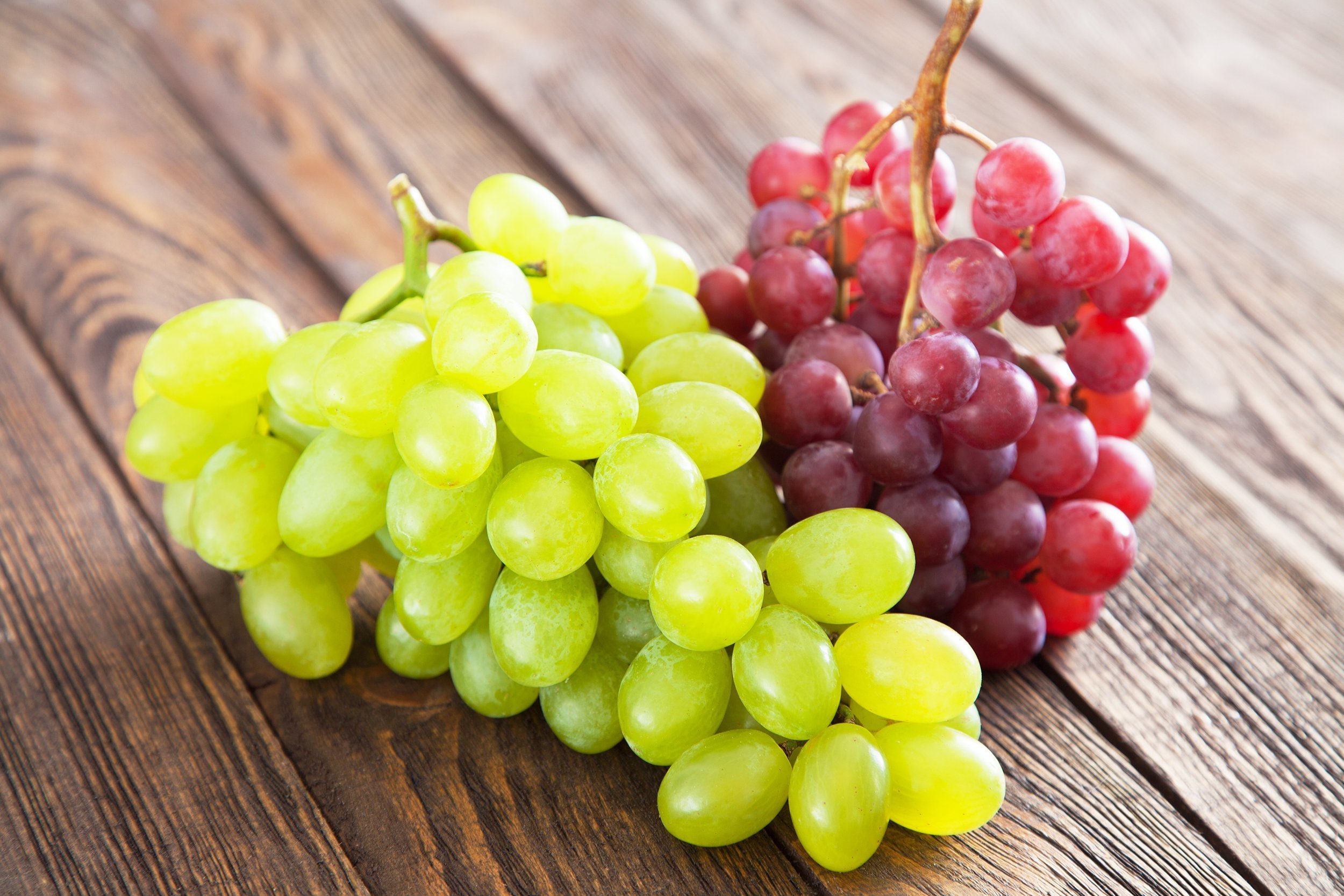 grapes on a wooden table