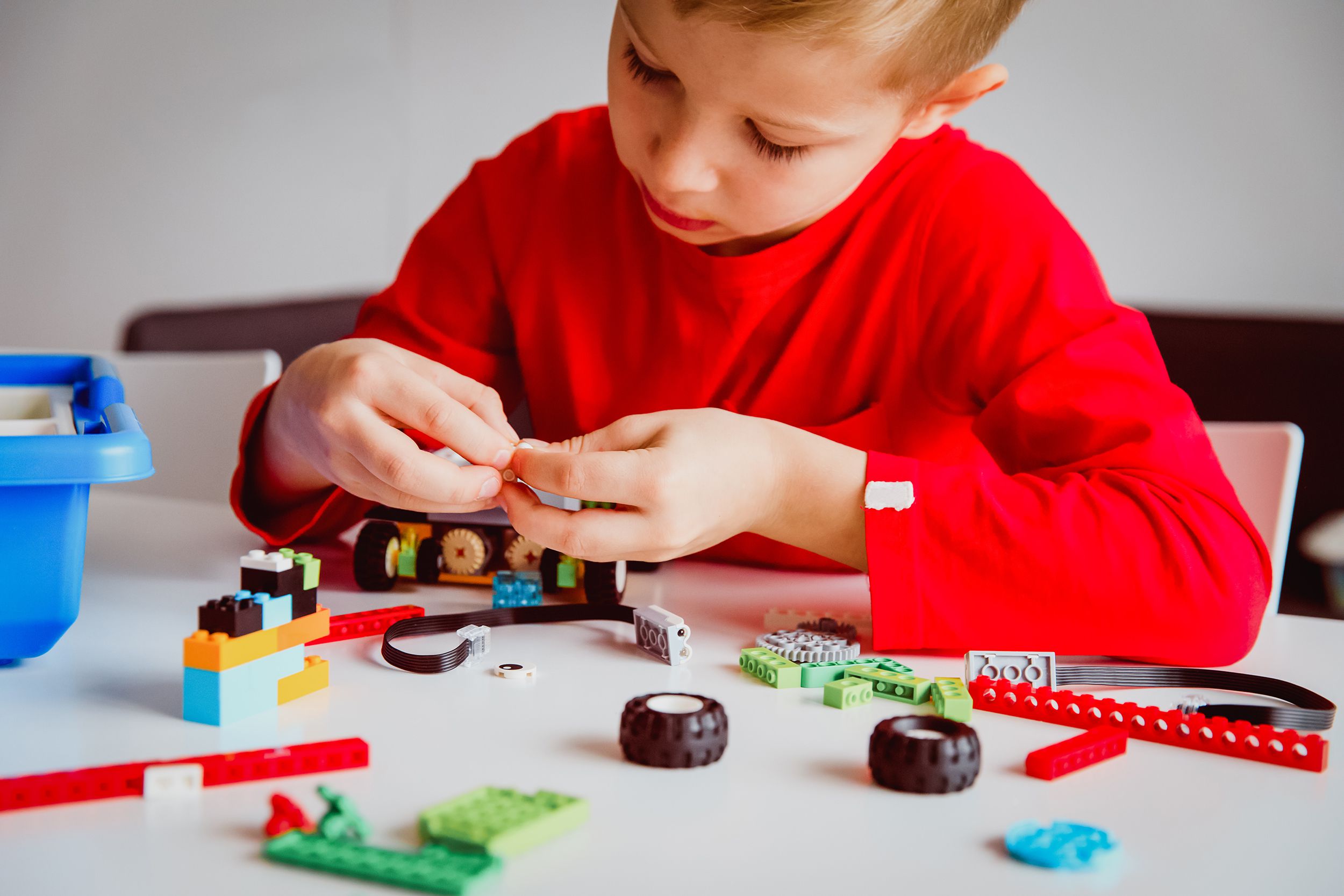 Young boy building toys