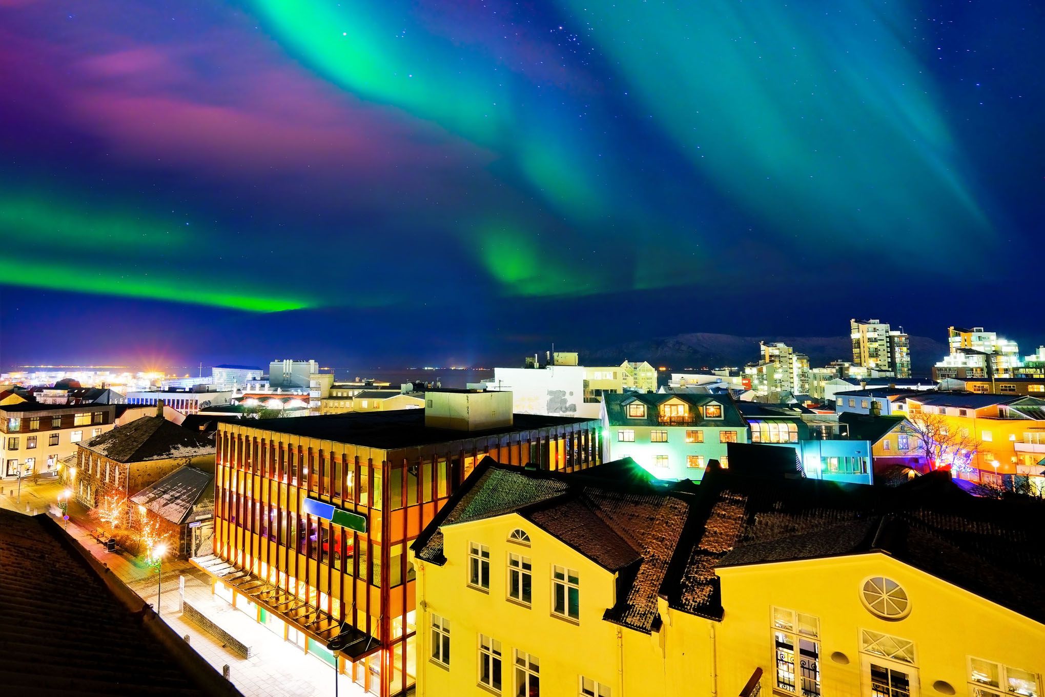 northern lights from reykjavik city center