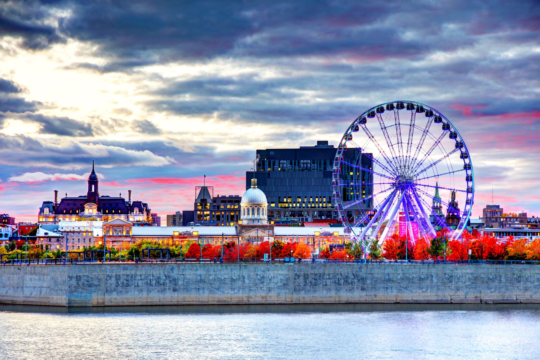 view of montreal on autumn at dusk with ferris wheel