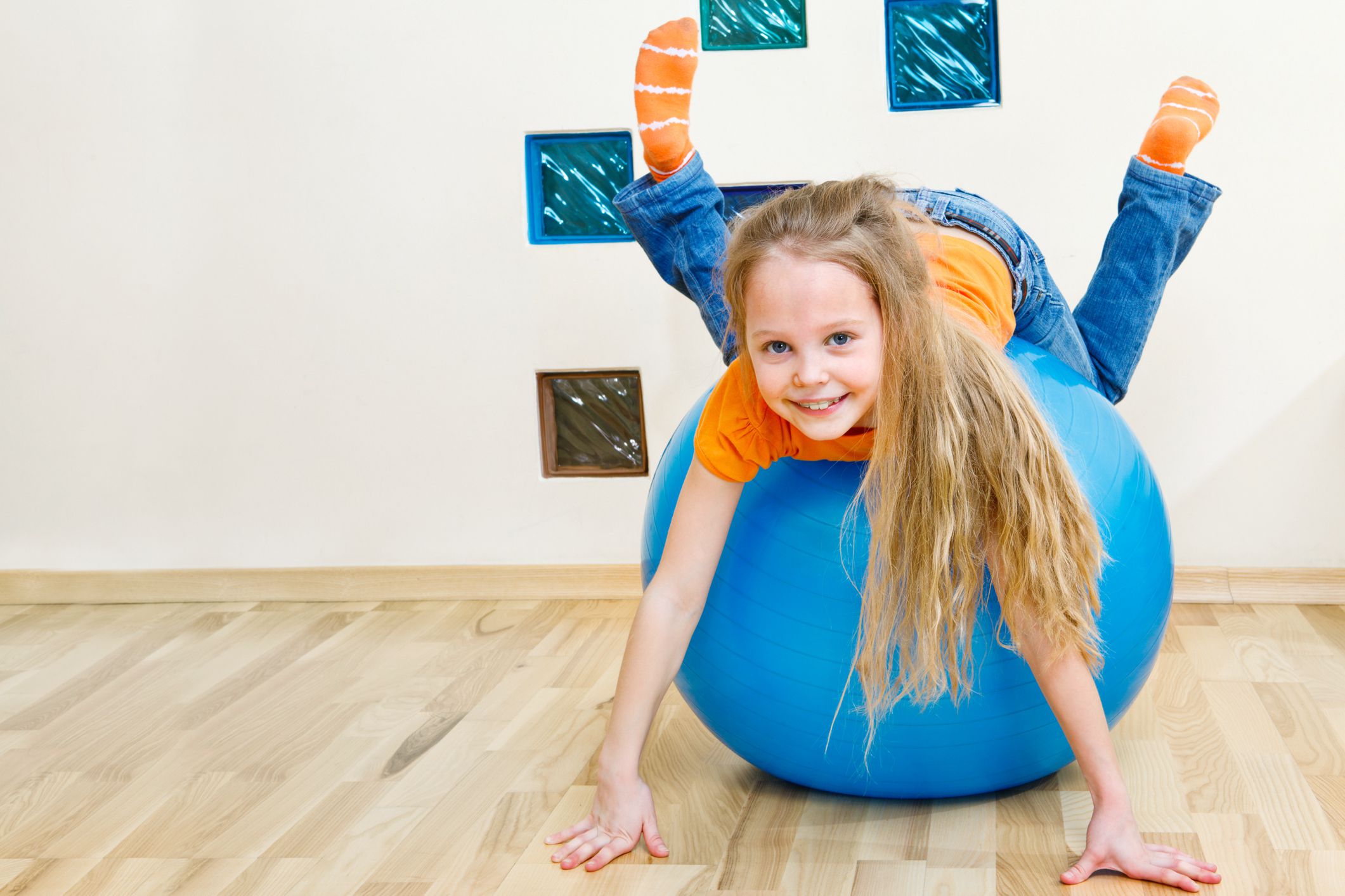 child on exercise ball