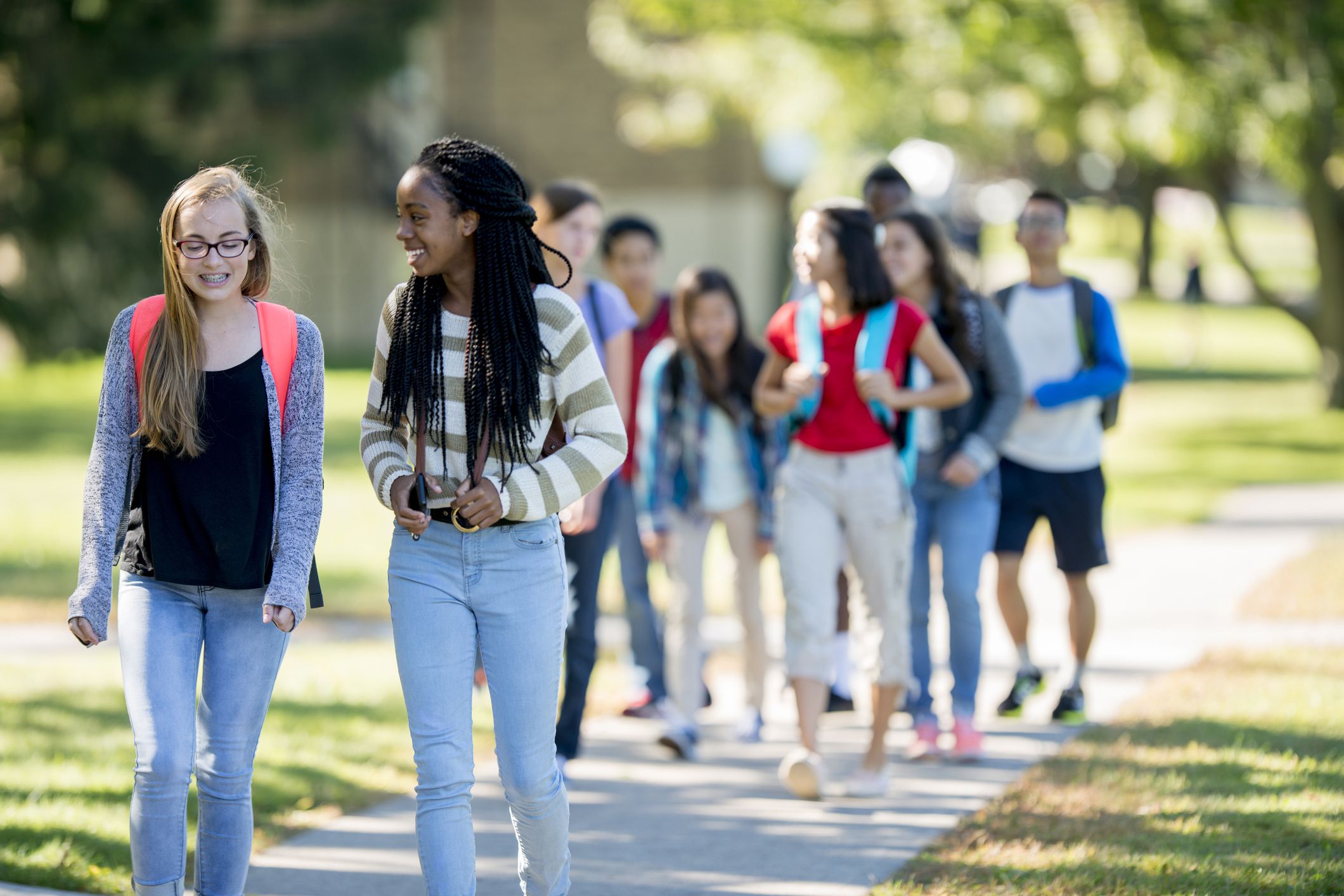 middle/high school students walking to school