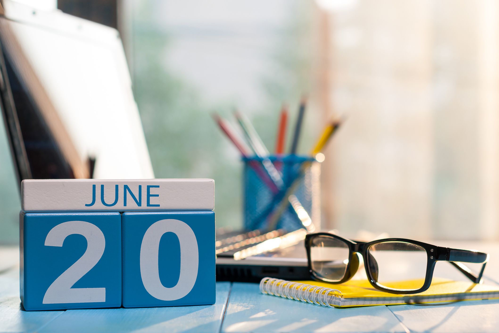 june 20th wooden color calendar on business background