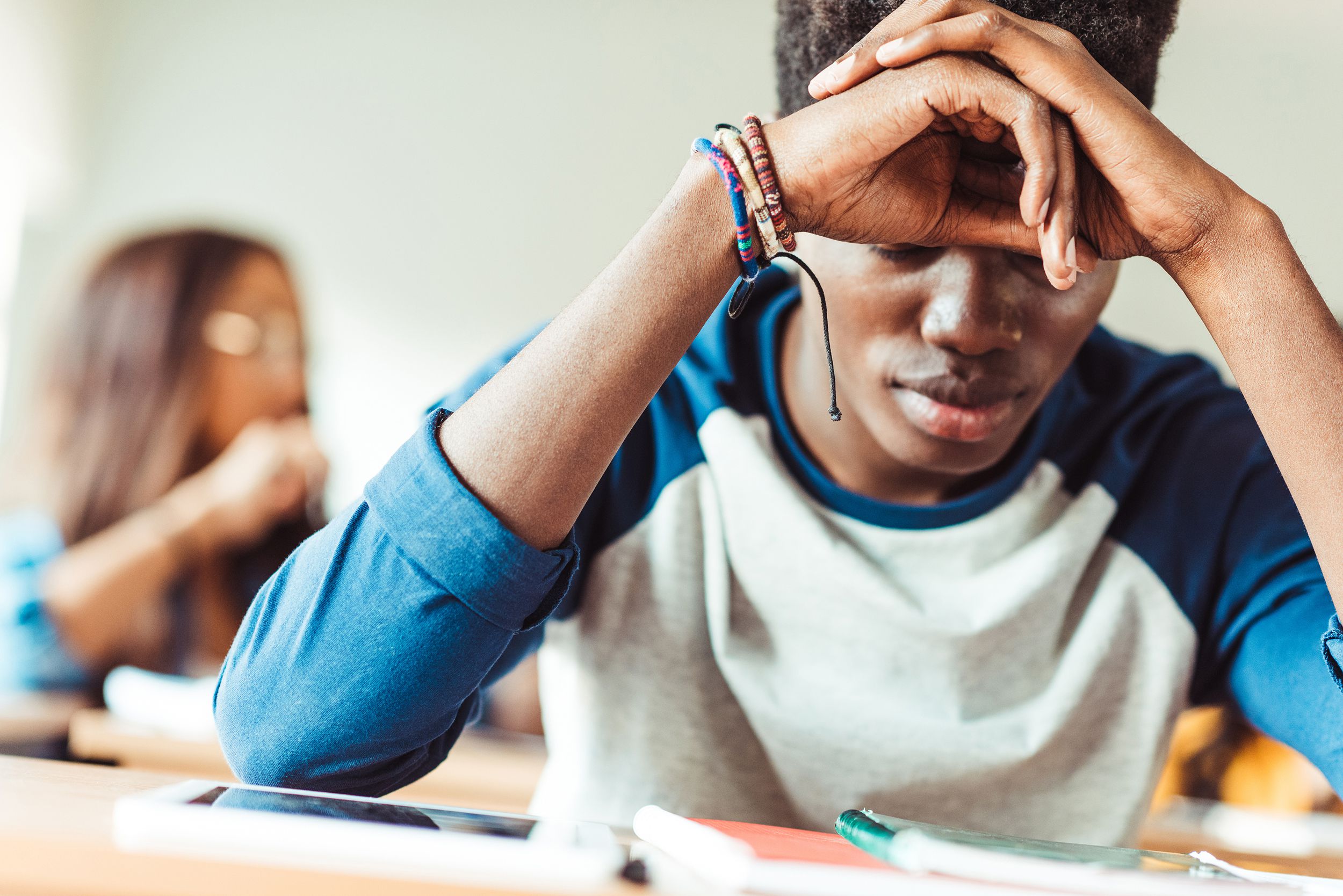 African American student sitting in class
