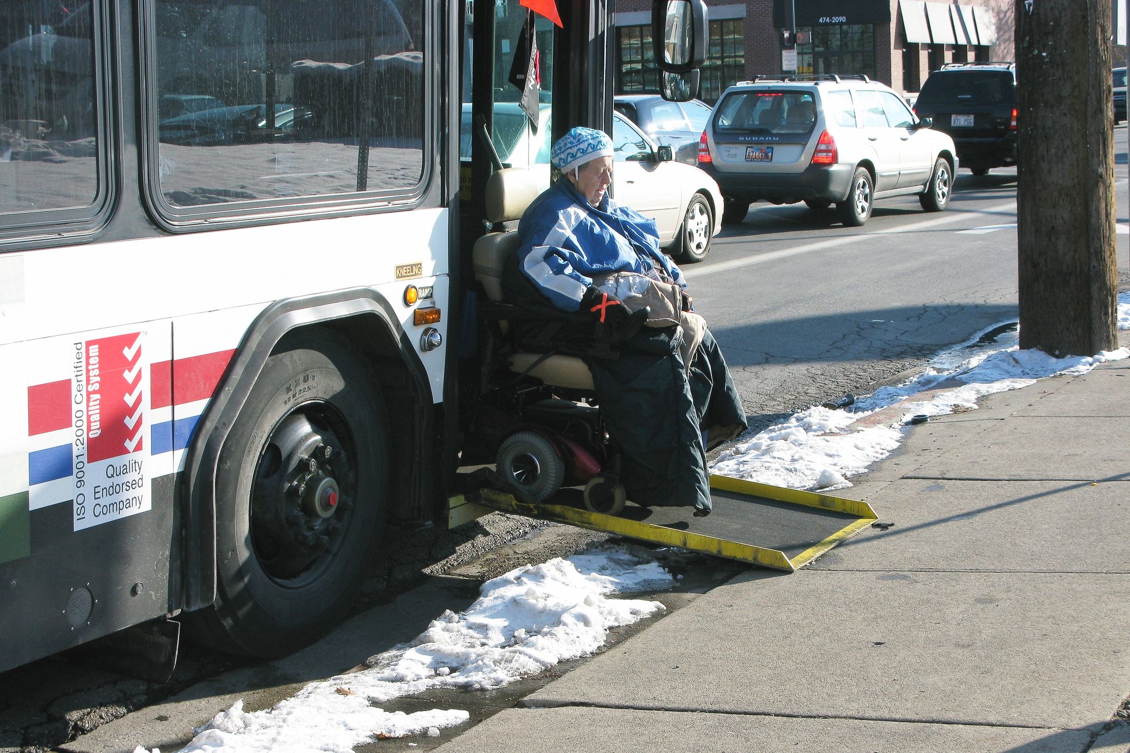 woman in wheelchair exiting bus in salt lake city