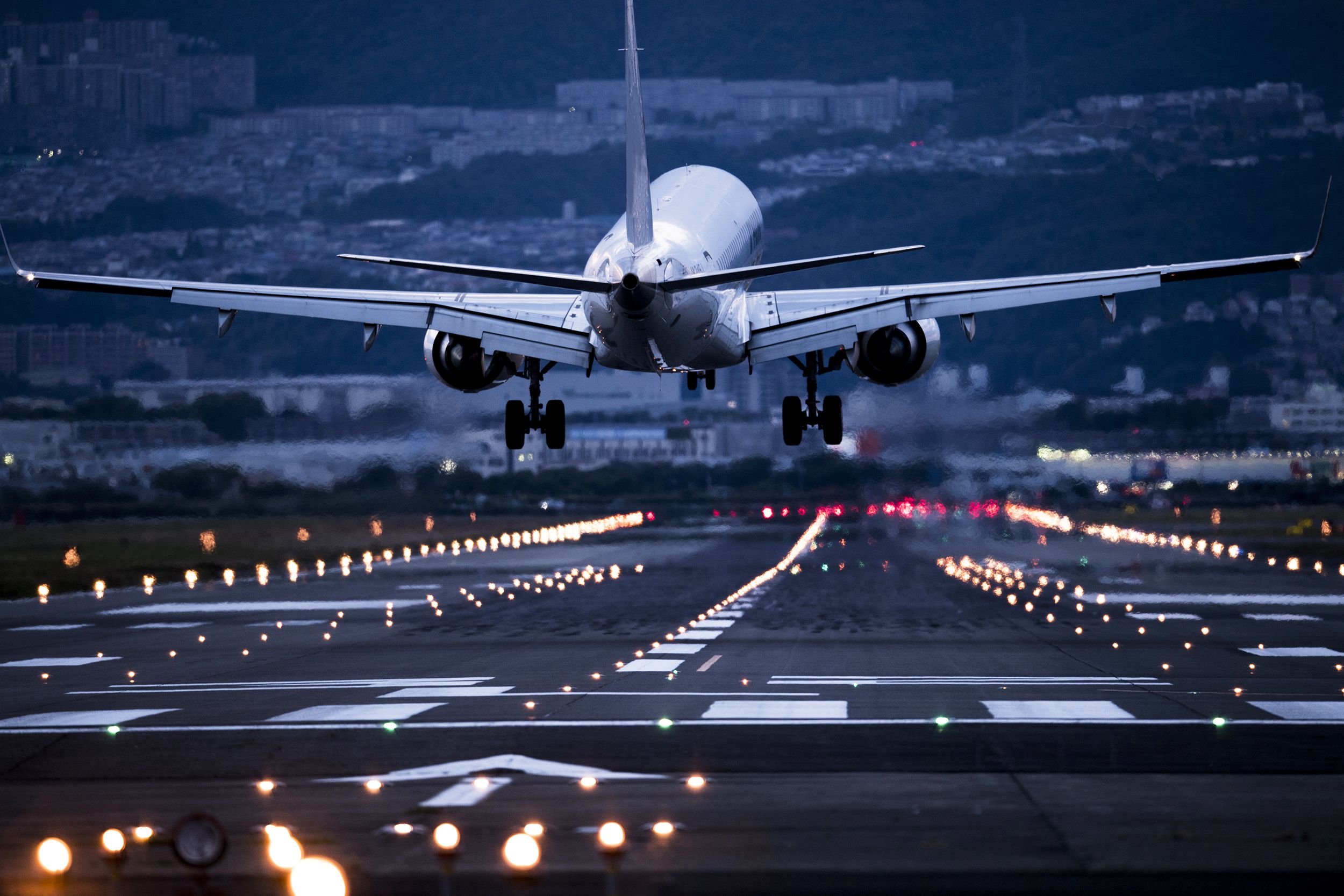 Airplane taking off in the early morning