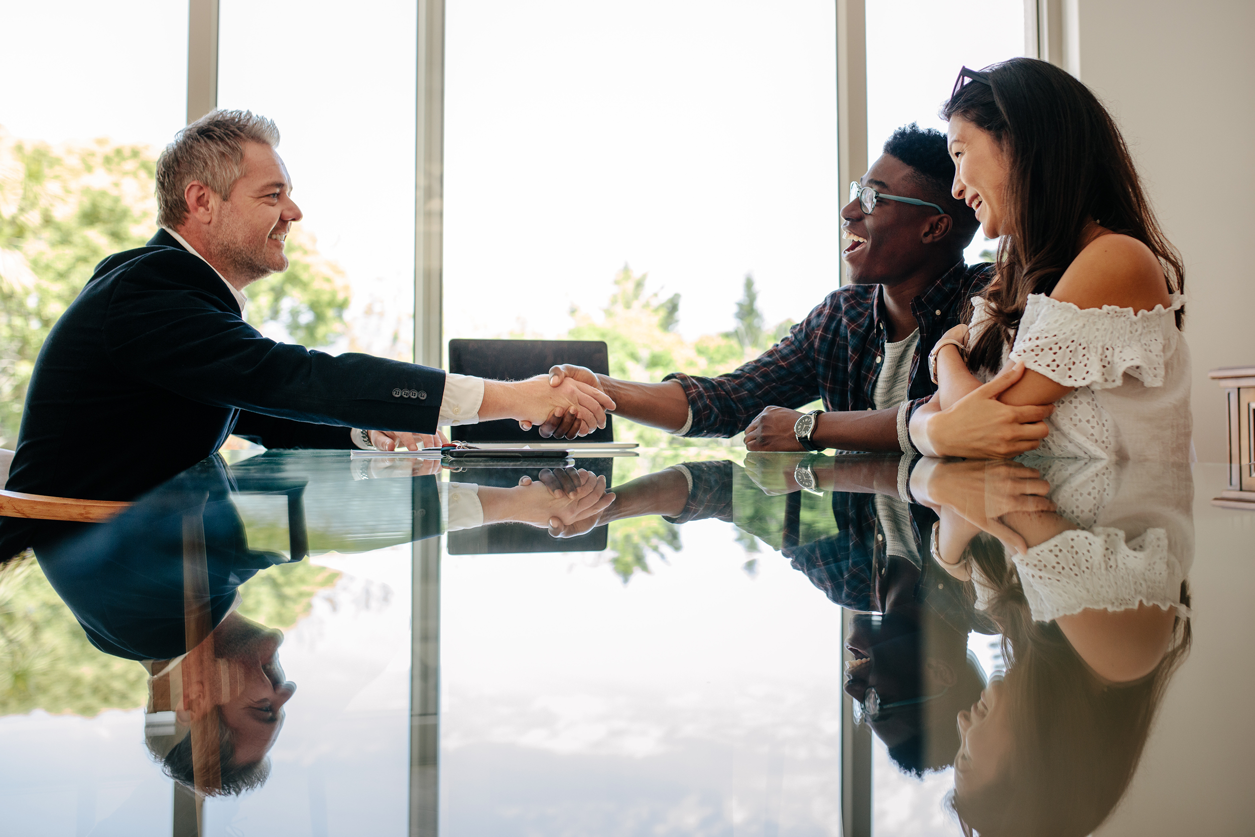 Couple meeting with a real estate broker