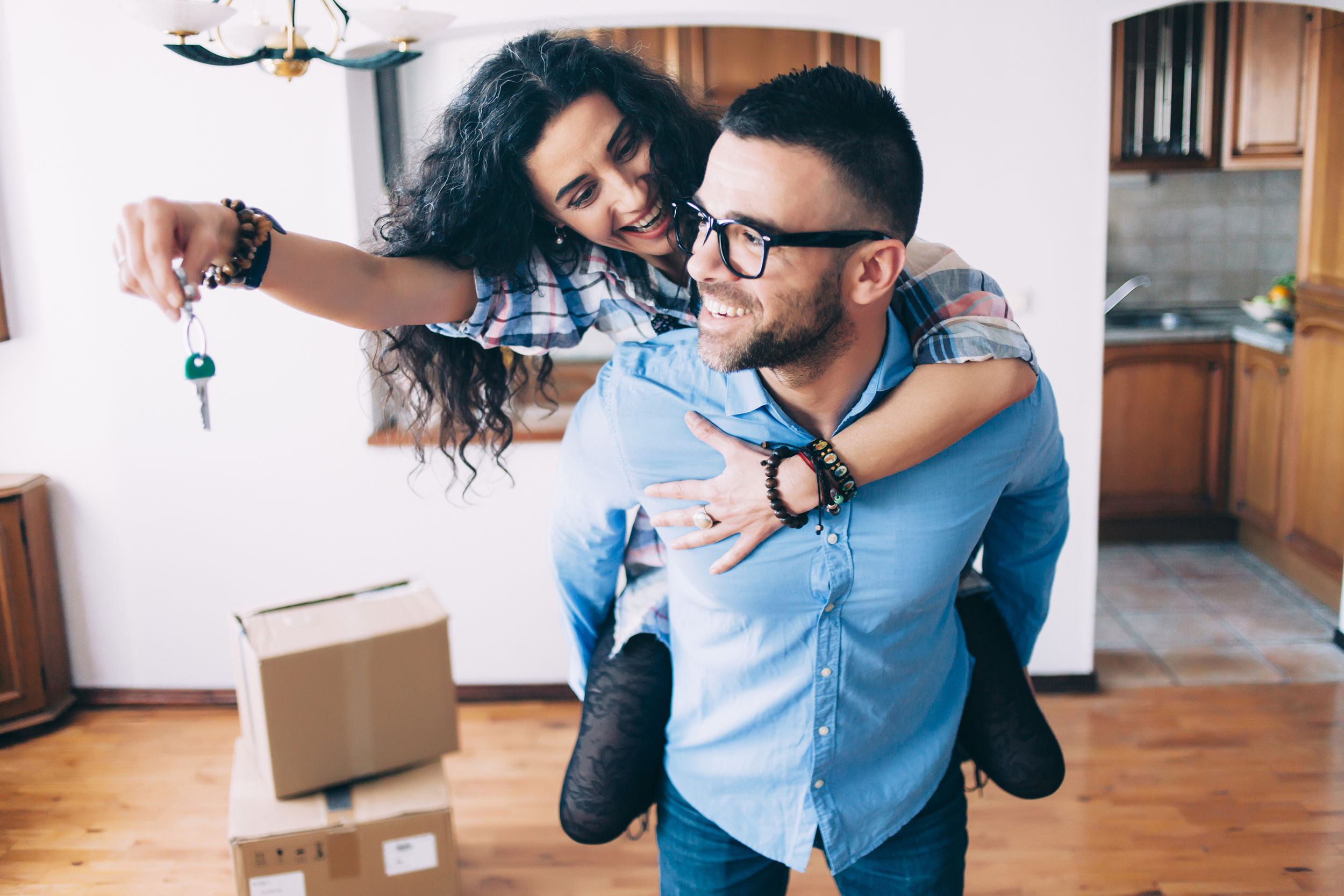 Happy couple who just bought a new house