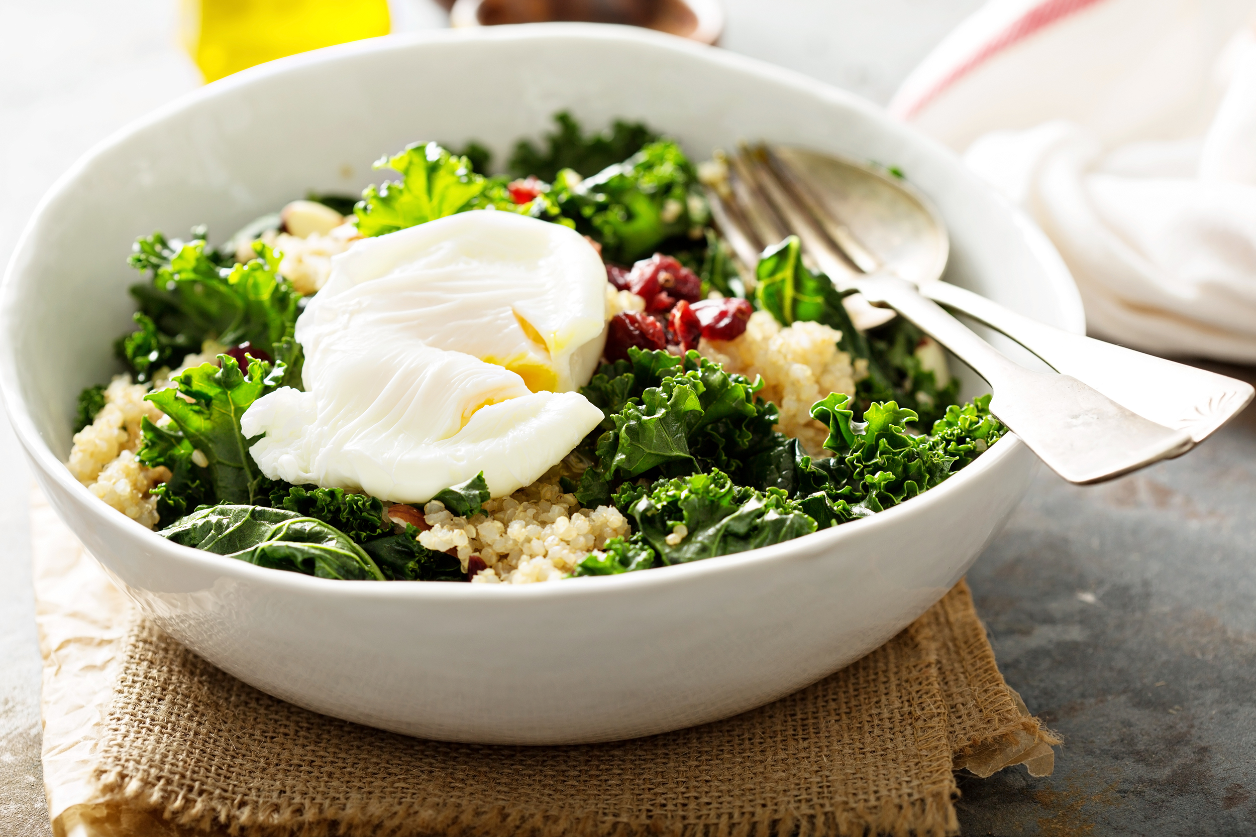 Kale grain bowl with an egg
