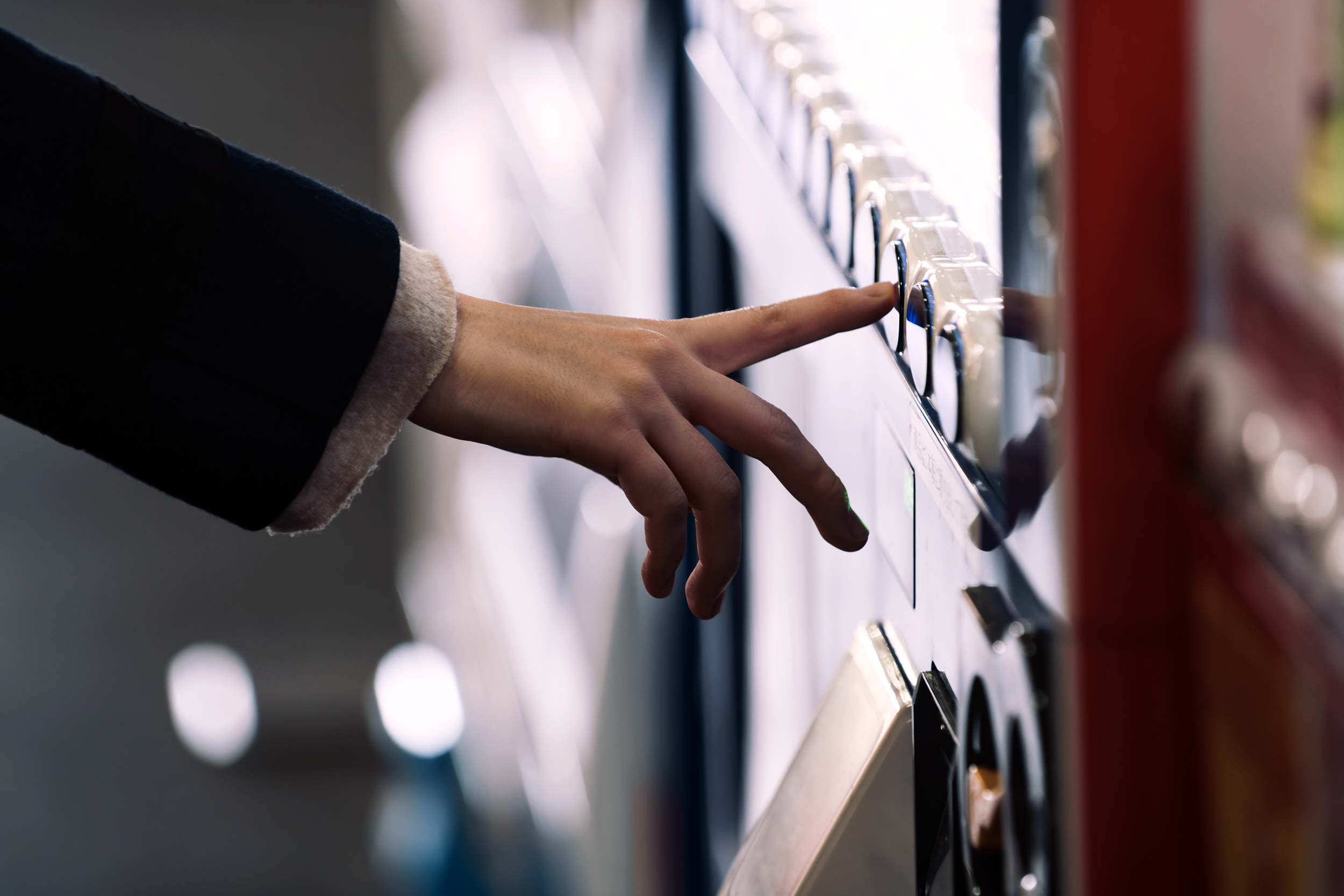 Man using a vending machine