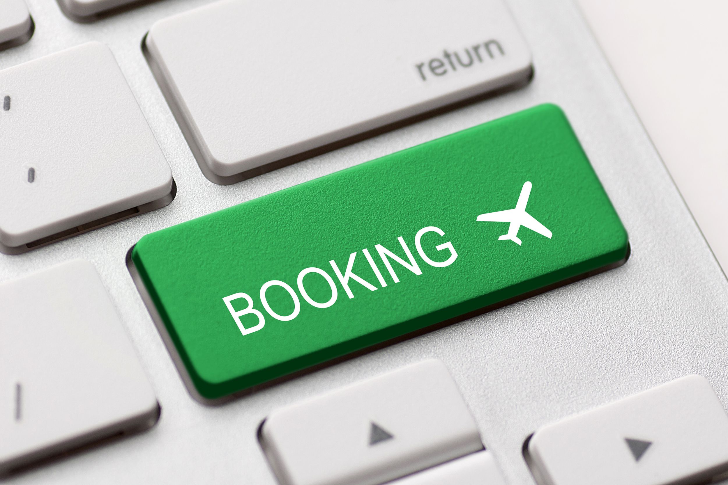 Flight booking button on a keyboard