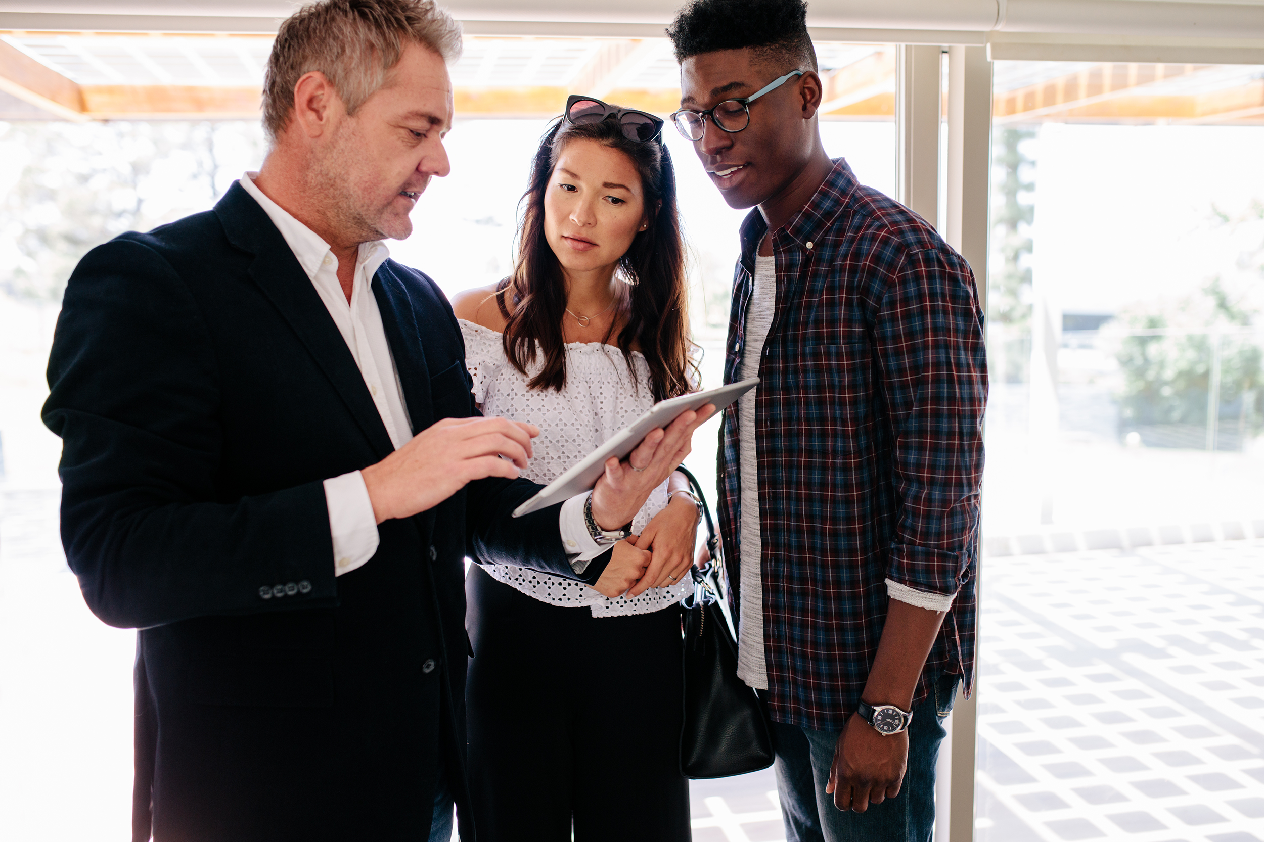 Couple meeting with a real estate agent