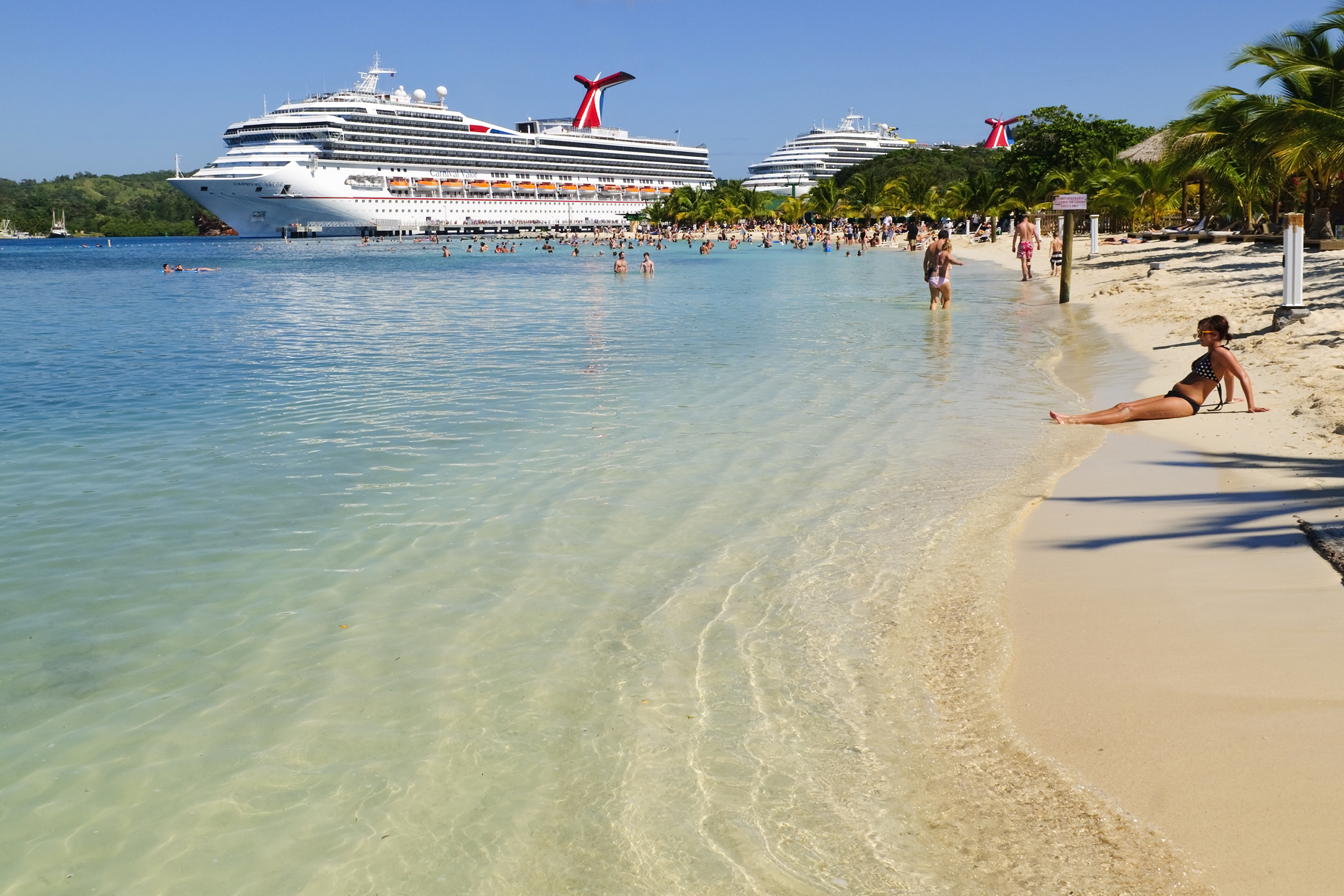 Cruise docked at an island