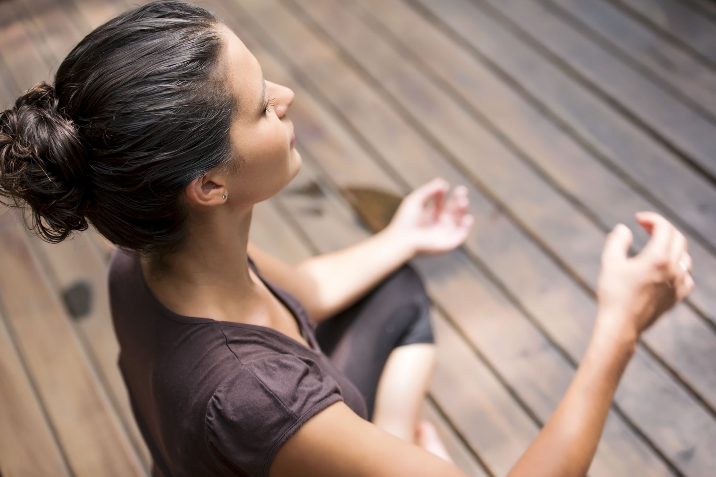 elevated view of woman meditating