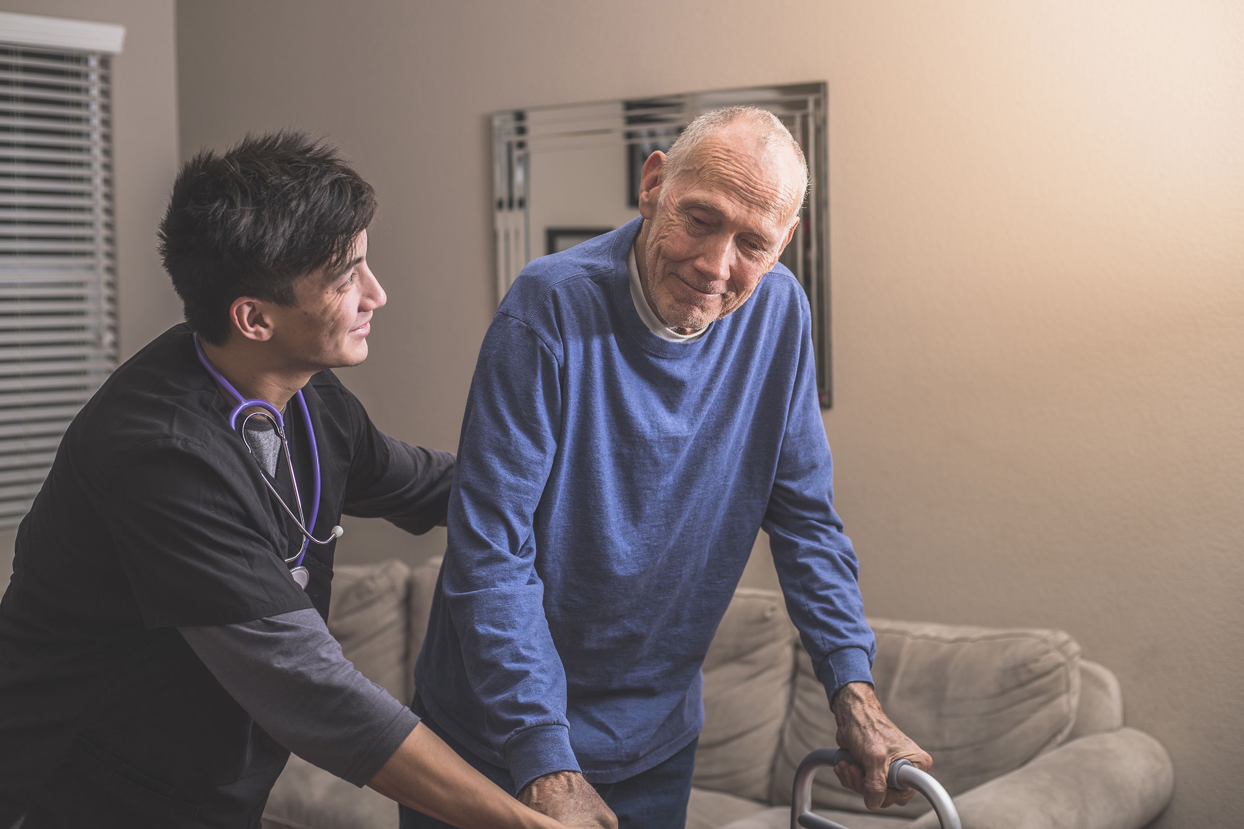 nurse visiting an elderly male patient