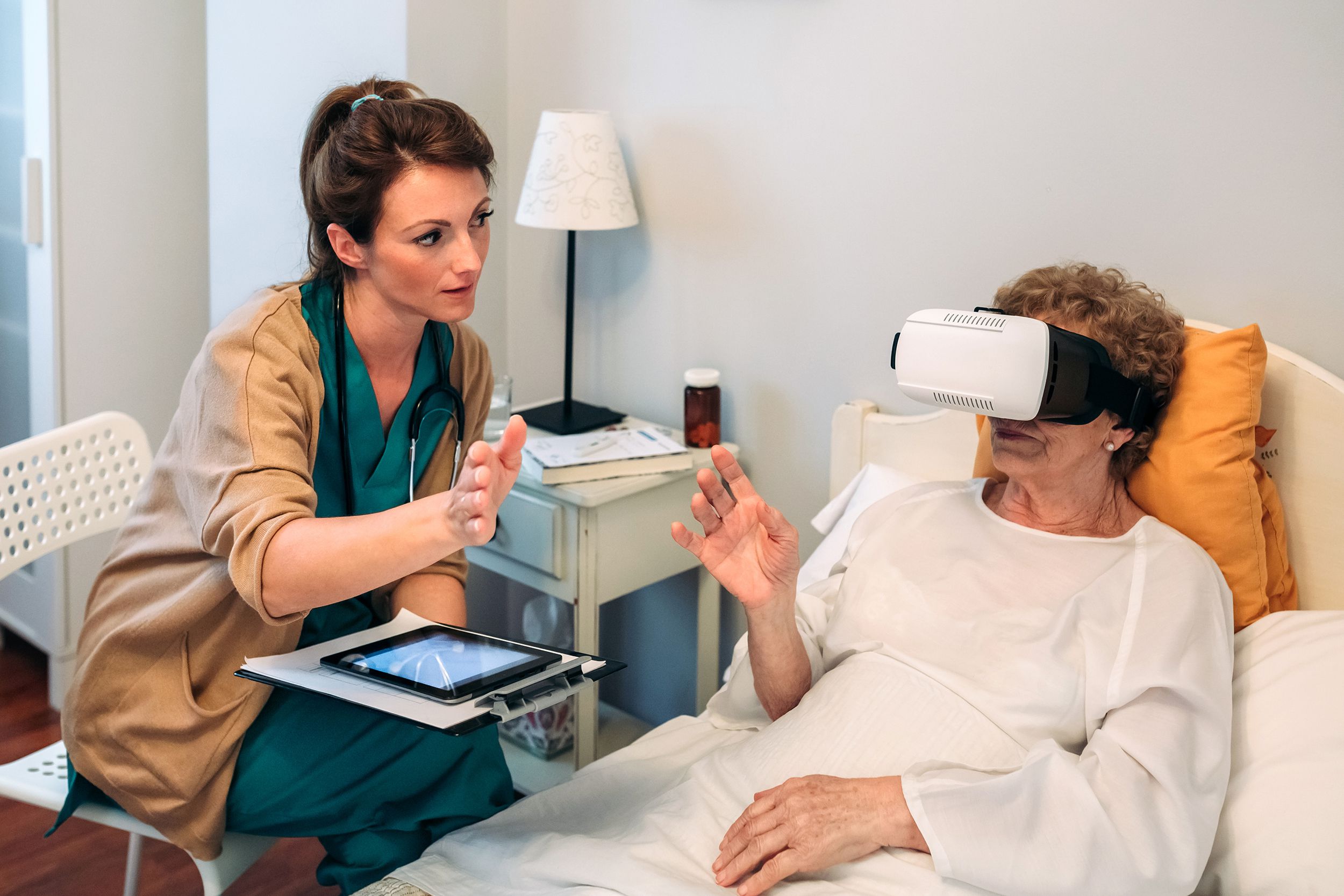older patient using virtual reality glasses