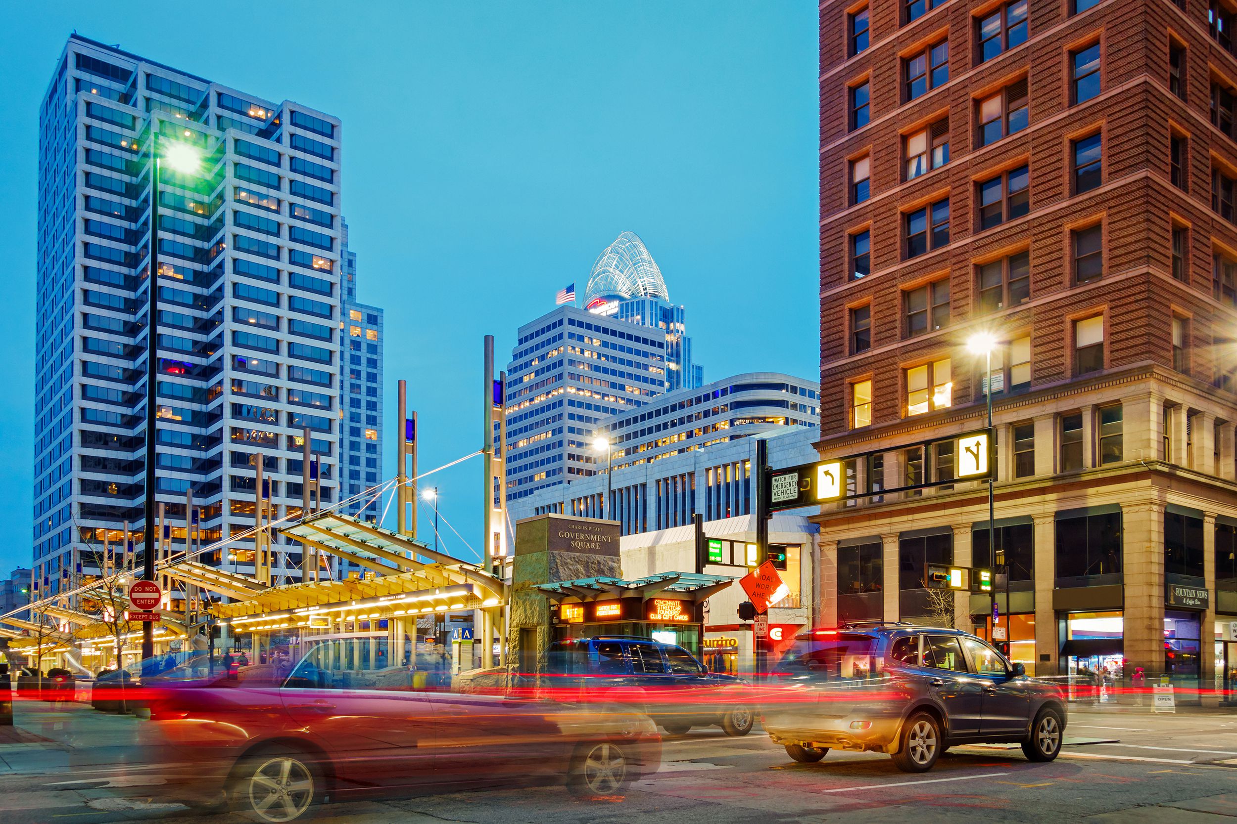 colorful urban scene with traffic in Downtown Cincinnati